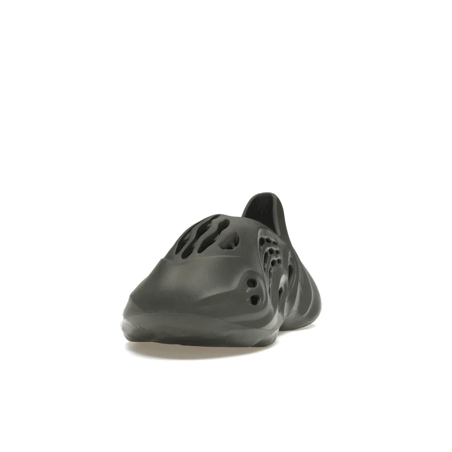 adidas Yeezy Foam RNR Carbon - Image 12 - Only at www.BallersClubKickz.com - Experience truly next-level comfort with the adidas Yeezy Foam RNR Carbon. With its one-piece foam and rubber construction, strategic perforations for optimal breathability, and sleek Carbon colorway, the sneaker is an unrelenting testament to Yeezy innovation. Available August 8, 2023, for $80.