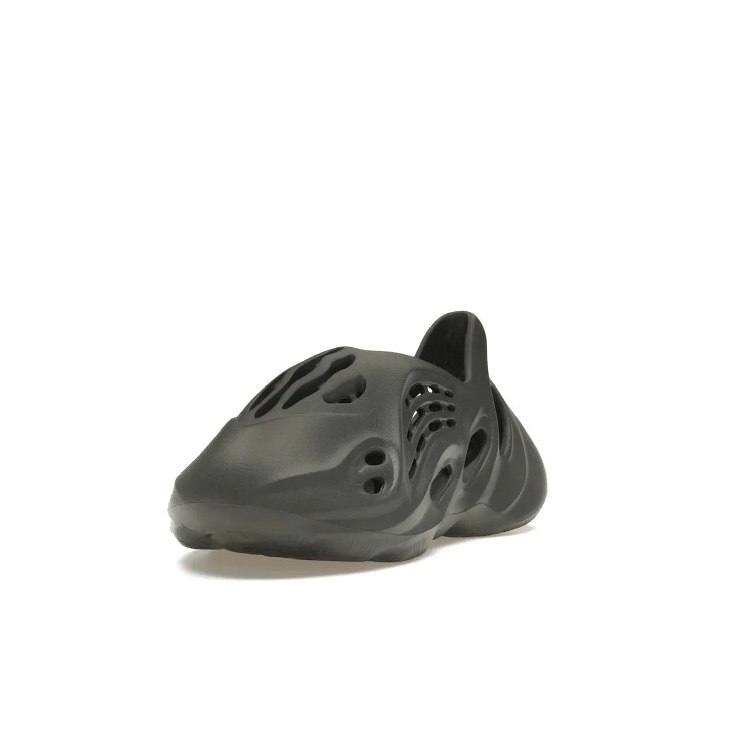 adidas Yeezy Foam RNR Carbon - Image 13 - Only at www.BallersClubKickz.com - Experience truly next-level comfort with the adidas Yeezy Foam RNR Carbon. With its one-piece foam and rubber construction, strategic perforations for optimal breathability, and sleek Carbon colorway, the sneaker is an unrelenting testament to Yeezy innovation. Available August 8, 2023, for $80.