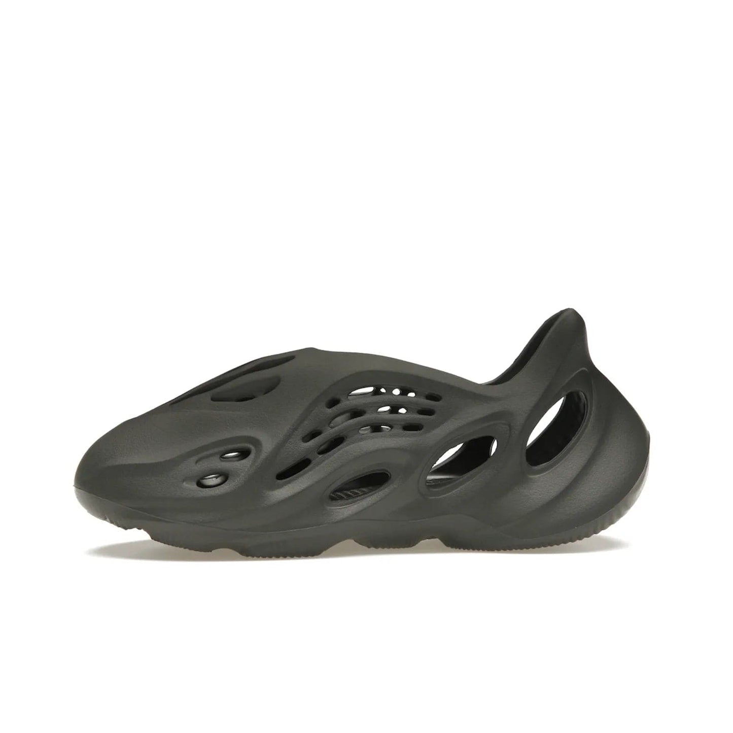 adidas Yeezy Foam RNR Carbon - Image 18 - Only at www.BallersClubKickz.com - Experience truly next-level comfort with the adidas Yeezy Foam RNR Carbon. With its one-piece foam and rubber construction, strategic perforations for optimal breathability, and sleek Carbon colorway, the sneaker is an unrelenting testament to Yeezy innovation. Available August 8, 2023, for $80.