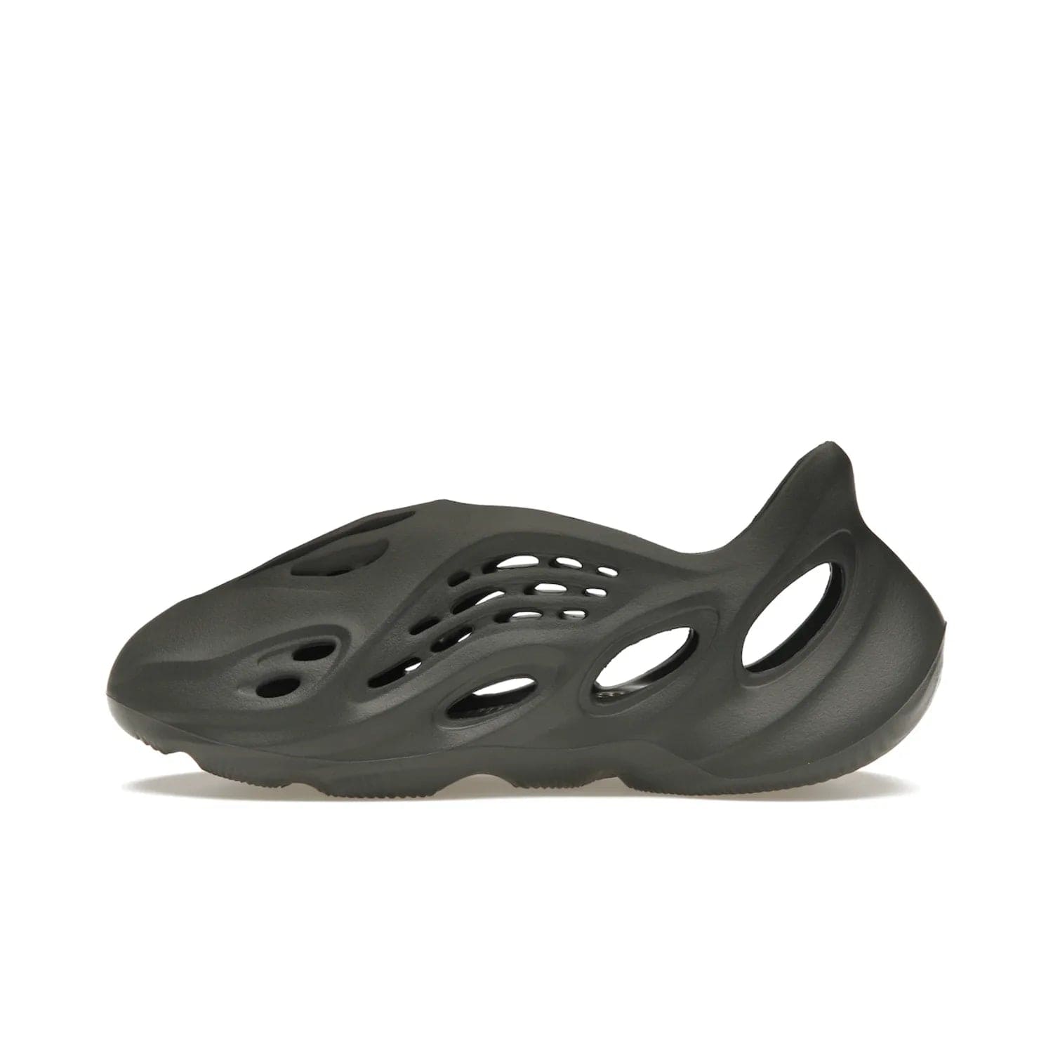 adidas Yeezy Foam RNR Carbon - Image 19 - Only at www.BallersClubKickz.com - Experience truly next-level comfort with the adidas Yeezy Foam RNR Carbon. With its one-piece foam and rubber construction, strategic perforations for optimal breathability, and sleek Carbon colorway, the sneaker is an unrelenting testament to Yeezy innovation. Available August 8, 2023, for $80.