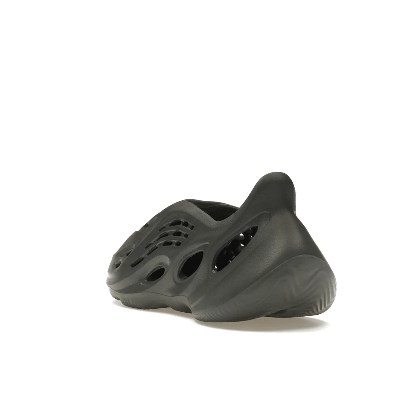 adidas Yeezy Foam RNR Carbon - Image 25 - Only at www.BallersClubKickz.com - Experience truly next-level comfort with the adidas Yeezy Foam RNR Carbon. With its one-piece foam and rubber construction, strategic perforations for optimal breathability, and sleek Carbon colorway, the sneaker is an unrelenting testament to Yeezy innovation. Available August 8, 2023, for $80.