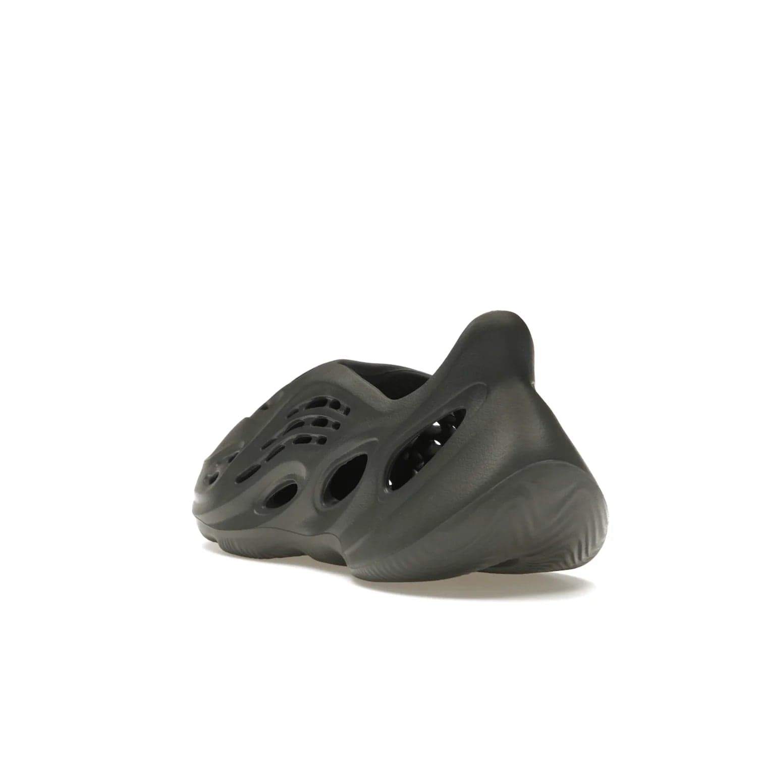 adidas Yeezy Foam RNR Carbon - Image 25 - Only at www.BallersClubKickz.com - Experience truly next-level comfort with the adidas Yeezy Foam RNR Carbon. With its one-piece foam and rubber construction, strategic perforations for optimal breathability, and sleek Carbon colorway, the sneaker is an unrelenting testament to Yeezy innovation. Available August 8, 2023, for $80.