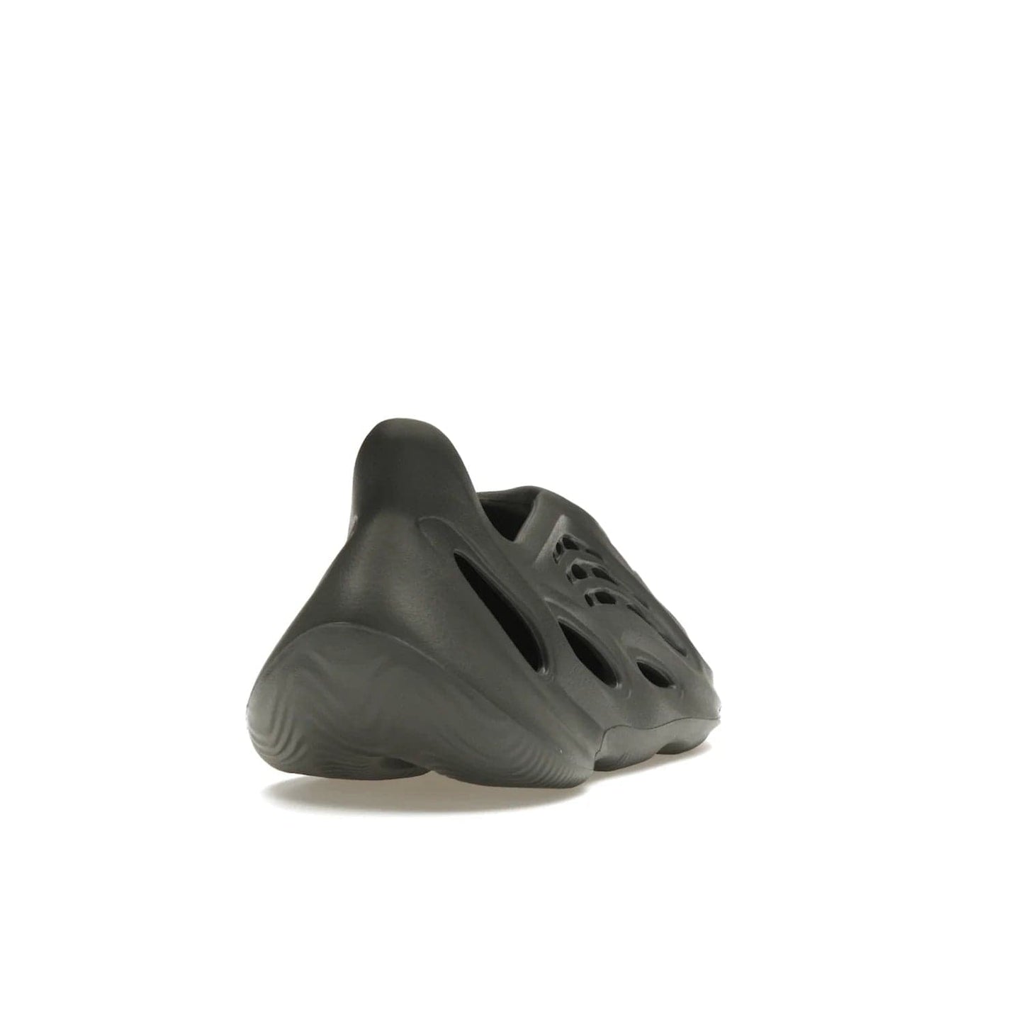 adidas Yeezy Foam RNR Carbon - Image 30 - Only at www.BallersClubKickz.com - Experience truly next-level comfort with the adidas Yeezy Foam RNR Carbon. With its one-piece foam and rubber construction, strategic perforations for optimal breathability, and sleek Carbon colorway, the sneaker is an unrelenting testament to Yeezy innovation. Available August 8, 2023, for $80.