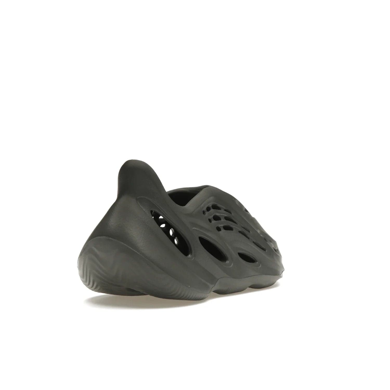 adidas Yeezy Foam RNR Carbon - Image 31 - Only at www.BallersClubKickz.com - Experience truly next-level comfort with the adidas Yeezy Foam RNR Carbon. With its one-piece foam and rubber construction, strategic perforations for optimal breathability, and sleek Carbon colorway, the sneaker is an unrelenting testament to Yeezy innovation. Available August 8, 2023, for $80.
