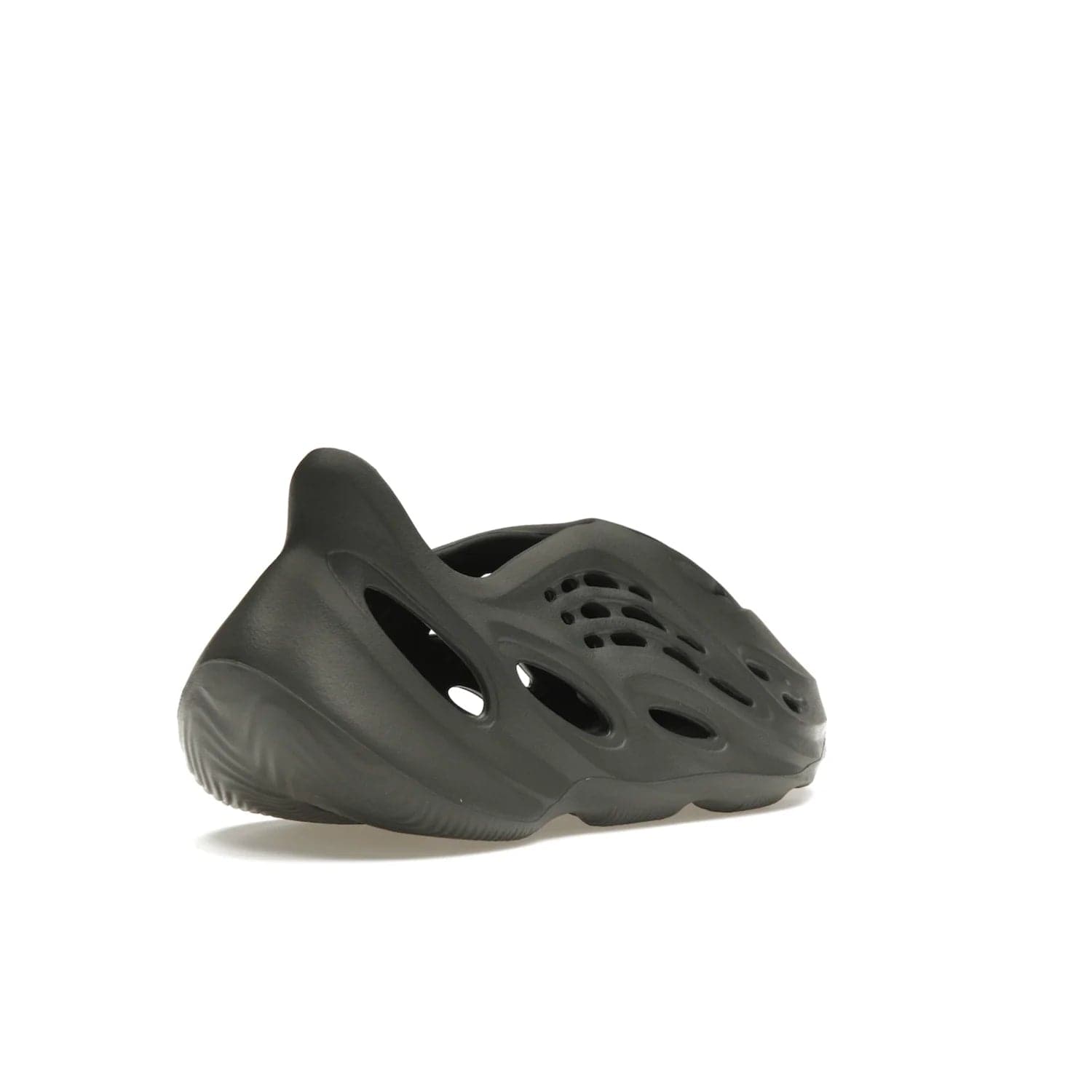 adidas Yeezy Foam RNR Carbon - Image 32 - Only at www.BallersClubKickz.com - Experience truly next-level comfort with the adidas Yeezy Foam RNR Carbon. With its one-piece foam and rubber construction, strategic perforations for optimal breathability, and sleek Carbon colorway, the sneaker is an unrelenting testament to Yeezy innovation. Available August 8, 2023, for $80.