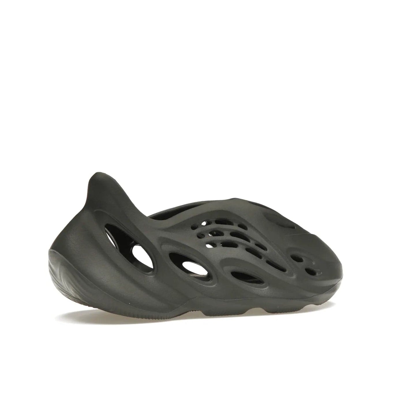 adidas Yeezy Foam RNR Carbon - Image 34 - Only at www.BallersClubKickz.com - Experience truly next-level comfort with the adidas Yeezy Foam RNR Carbon. With its one-piece foam and rubber construction, strategic perforations for optimal breathability, and sleek Carbon colorway, the sneaker is an unrelenting testament to Yeezy innovation. Available August 8, 2023, for $80.