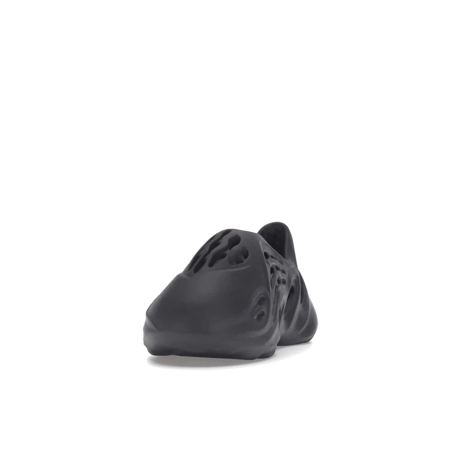 adidas Yeezy Foam RNR Onyx (Kids) - Image 12 - Only at www.BallersClubKickz.com - The adidas Yeezy Foam RNR Kids Onyx is a futuristic take on a classic shoe. This shoe comes with an all-over onyx colourway, EVA foam upper & textured footbed. Wavy traction pattern ensures grip & the design was released in June 2022 with a retail price of $60.