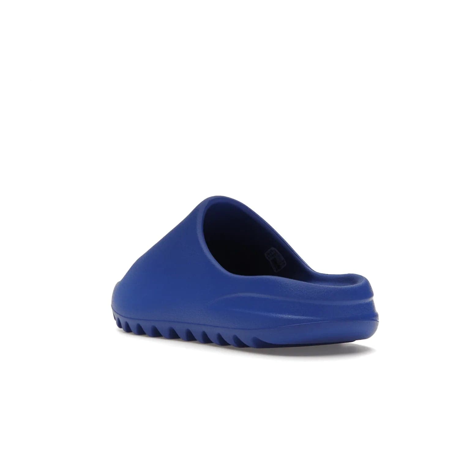 adidas Yeezy Slide Azure - Image 25 - Only at www.BallersClubKickz.com - Elevate your look with the adidas Yeezy Slide Azure. Boasting a vibrant hue for a unique style, this EVA foam slide is a statement of fearlessness and stylish expression. Step out with confidence knowing you're wearing more than a slide.