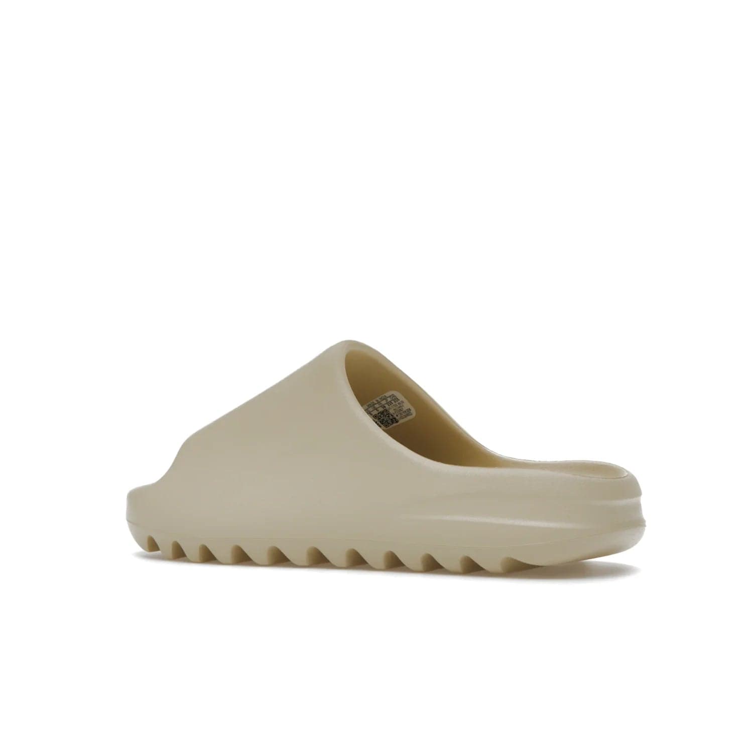 adidas Yeezy Slide Bone (2022 Restock) - Image 22 - Only at www.BallersClubKickz.com - Stay comfy with the adidas Yeezy Slide Bone - a fashionable silhouette with all-day comfort. This Bone/Bone/Bone colorway combines style and comfort with a pebbled texture and grooved sole. Restocked in May 2022, this shoe is the perfect addition to your collection.