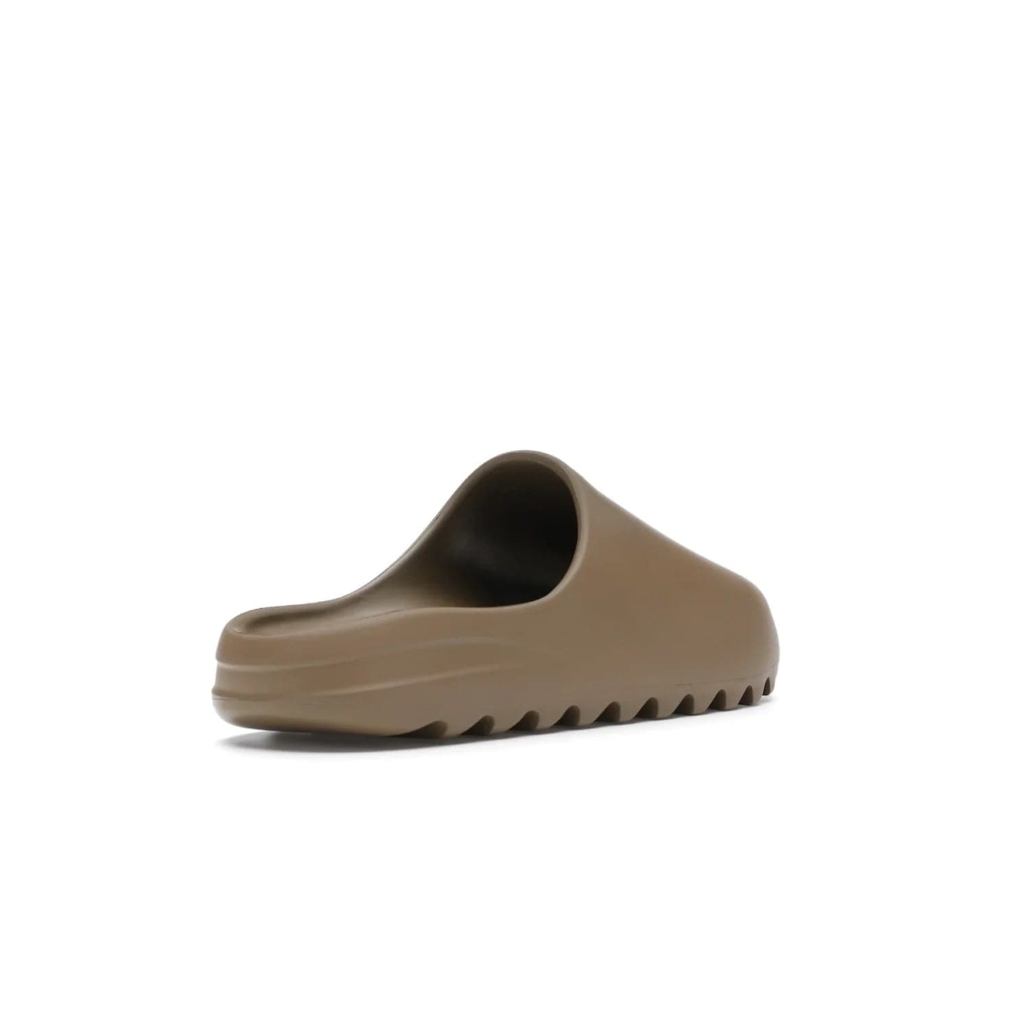 adidas Yeezy Slide Core - Image 32 - Only at www.BallersClubKickz.com - Experience lightweight comfort and cushioning with the adidas Yeezy Slide Core. Features EVA foam upper, soft footbed & grooved outsole for optimal traction & support. The Core/Core/Core colorway released April 2021.