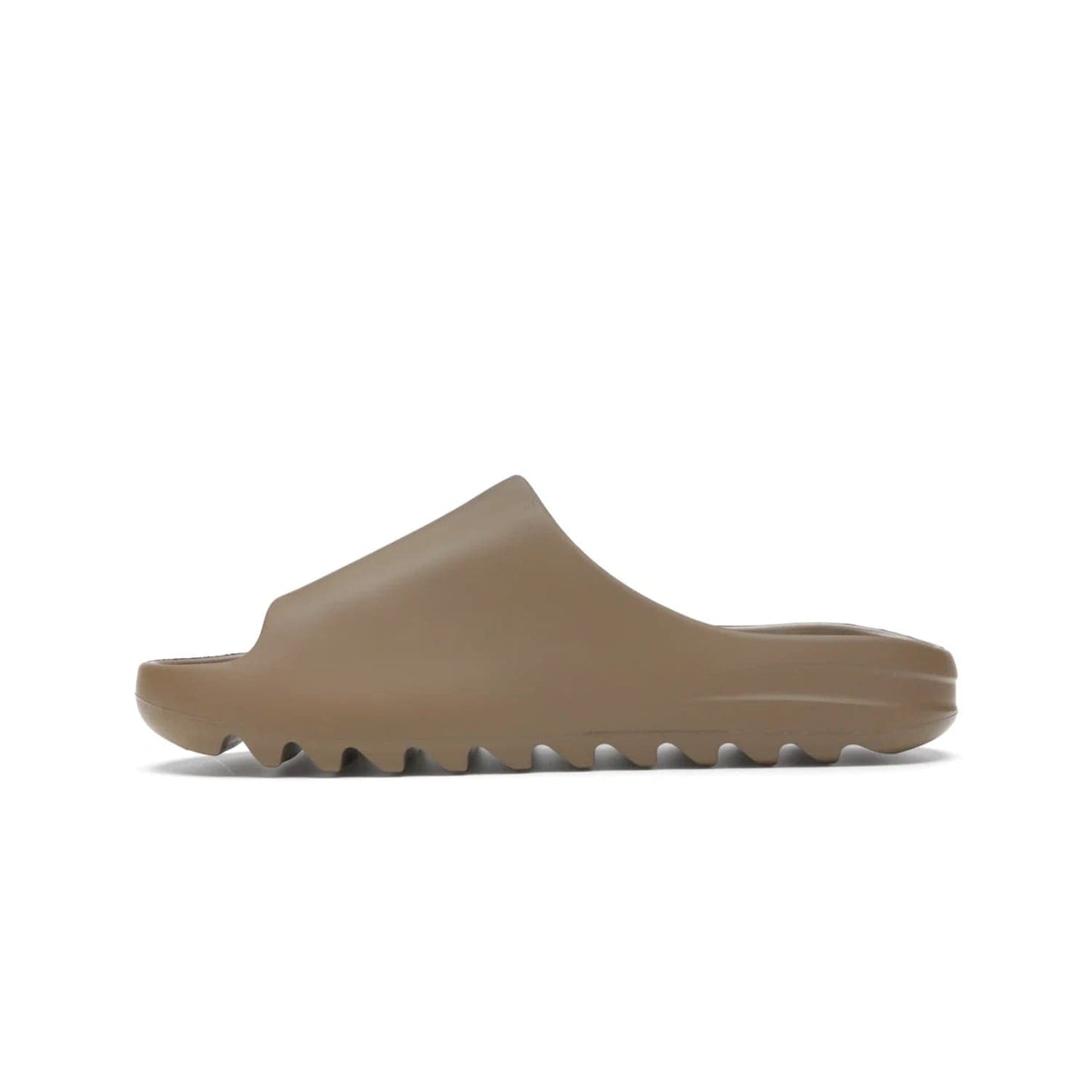 adidas Yeezy Slide Core - Image 19 - Only at www.BallersClubKickz.com - Experience lightweight comfort and cushioning with the adidas Yeezy Slide Core. Features EVA foam upper, soft footbed & grooved outsole for optimal traction & support. The Core/Core/Core colorway released April 2021.