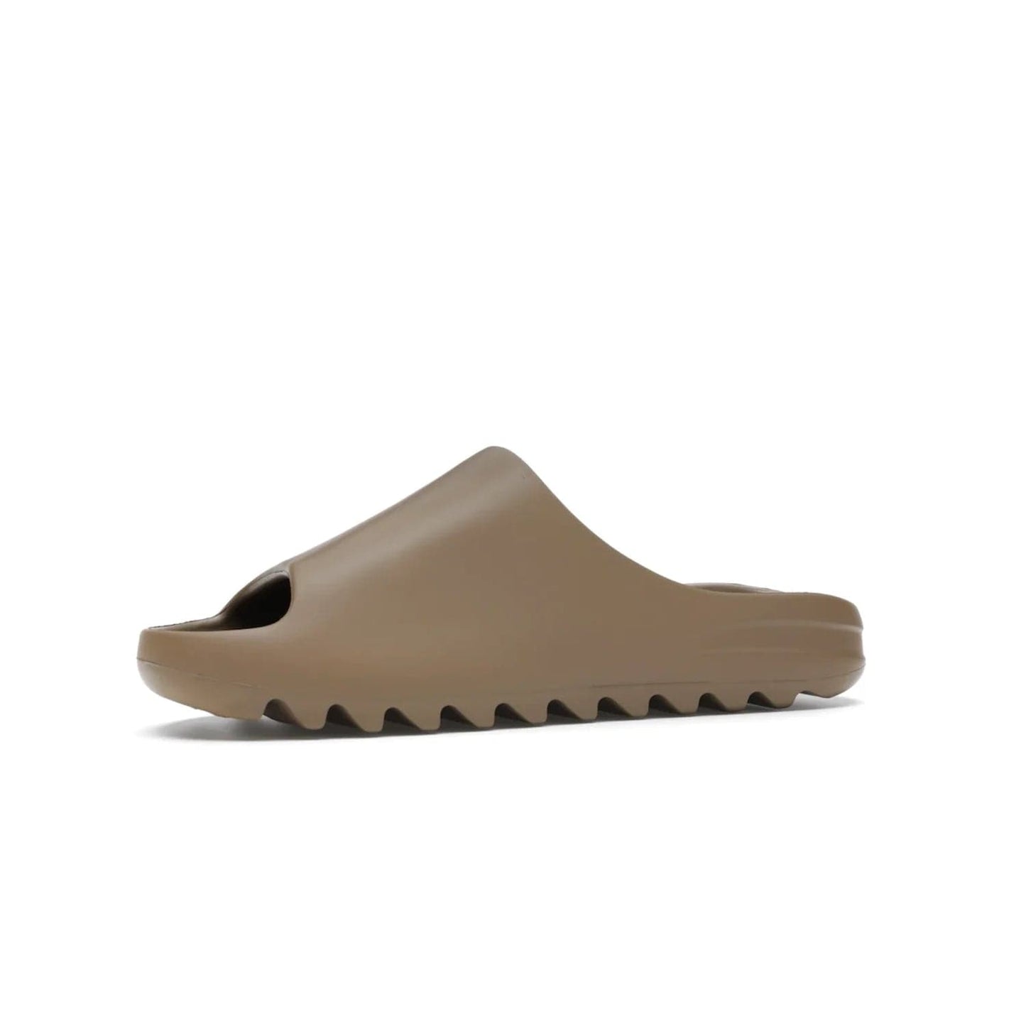adidas Yeezy Slide Core - Image 17 - Only at www.BallersClubKickz.com - Experience lightweight comfort and cushioning with the adidas Yeezy Slide Core. Features EVA foam upper, soft footbed & grooved outsole for optimal traction & support. The Core/Core/Core colorway released April 2021.