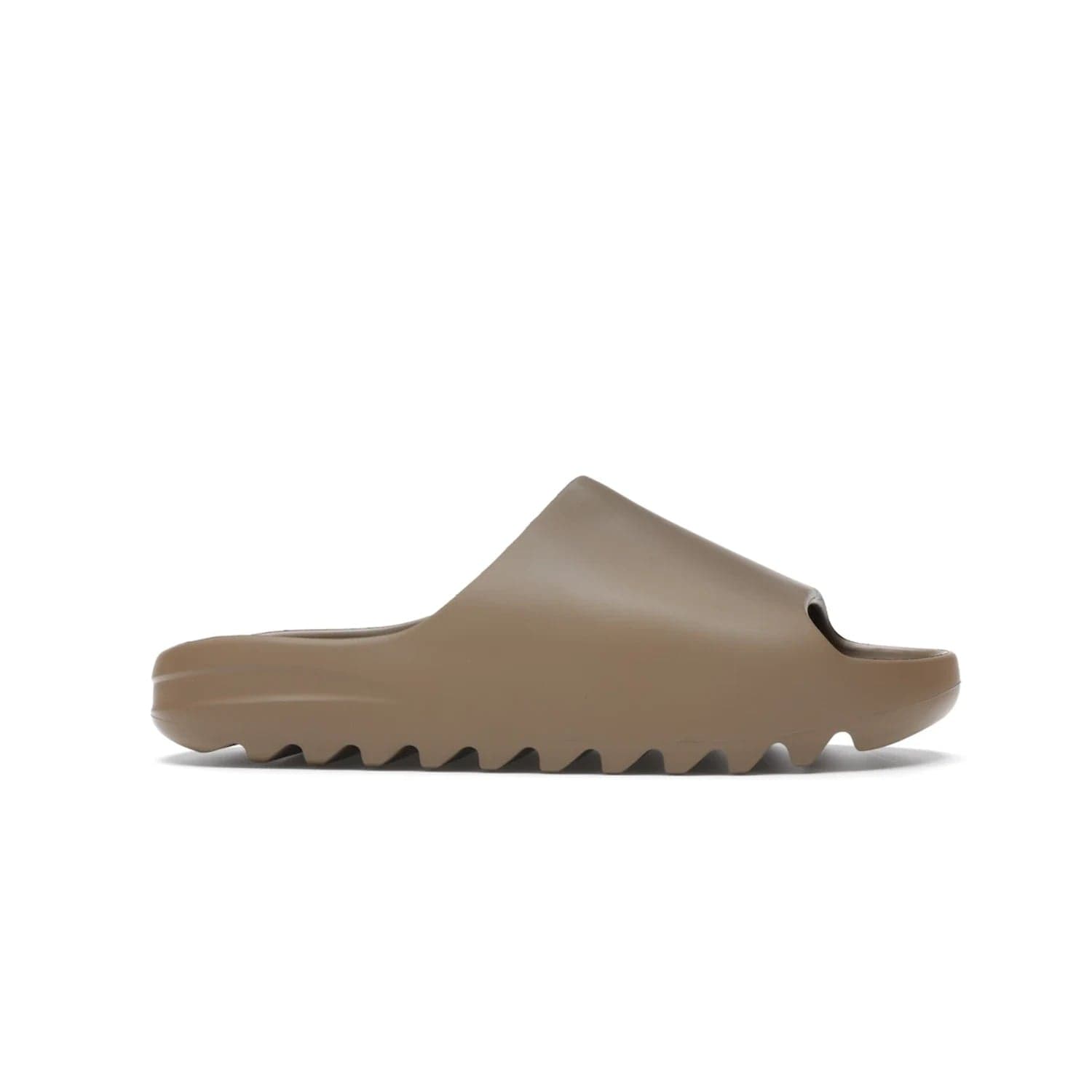 adidas Yeezy Slide Core - Image 2 - Only at www.BallersClubKickz.com - Experience lightweight comfort and cushioning with the adidas Yeezy Slide Core. Features EVA foam upper, soft footbed & grooved outsole for optimal traction & support. The Core/Core/Core colorway released April 2021.