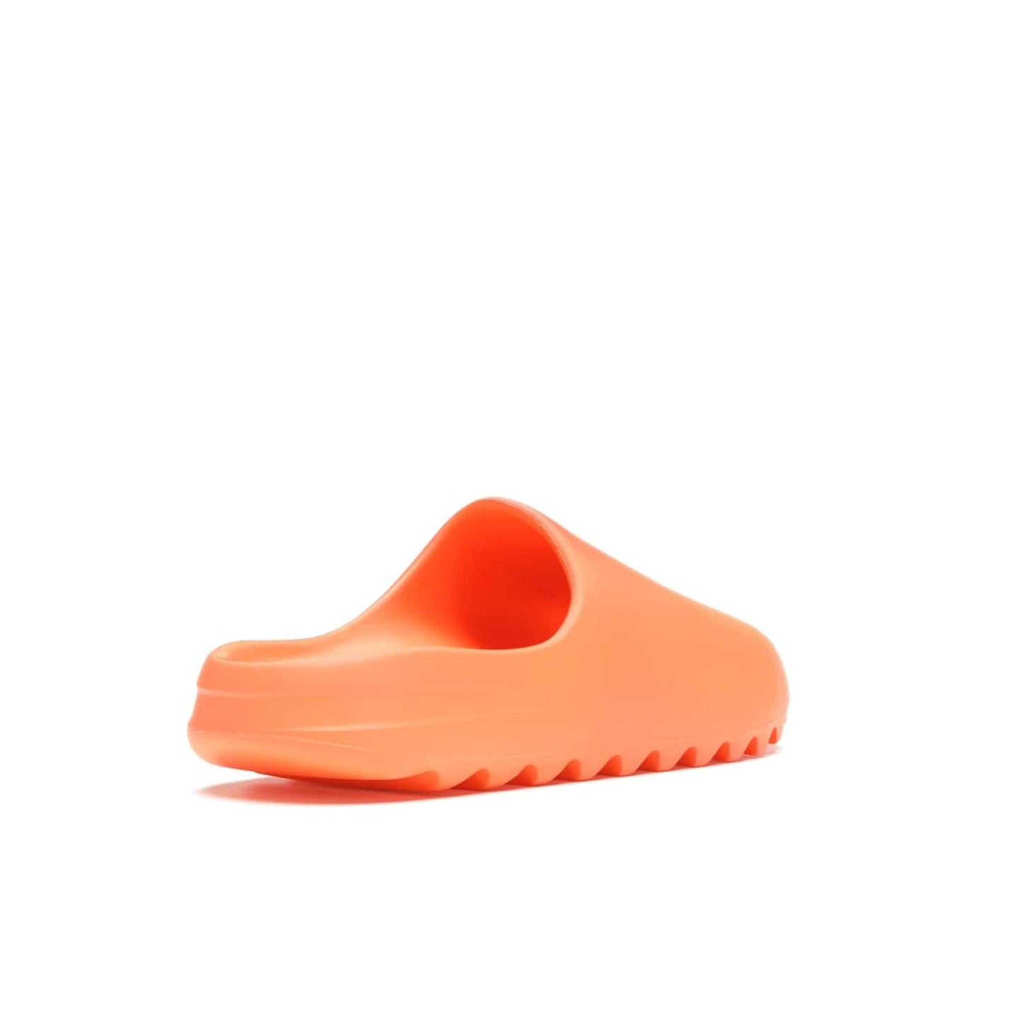 adidas Yeezy Slide Enflame Orange - Image 32 - Only at www.BallersClubKickz.com - Limited edition adidas Yeezy Slide featuring a bold Enflame Orange upper and EVA foam construction. Grooved outsole for traction and support. Released June 2021. Perfect for summer.