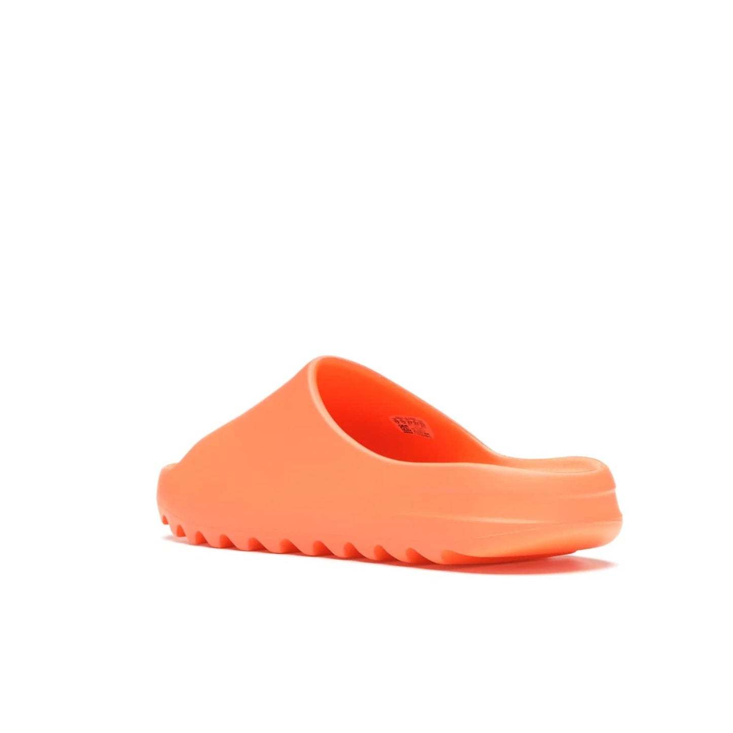 adidas Yeezy Slide Enflame Orange - Image 24 - Only at www.BallersClubKickz.com - Limited edition adidas Yeezy Slide featuring a bold Enflame Orange upper and EVA foam construction. Grooved outsole for traction and support. Released June 2021. Perfect for summer.