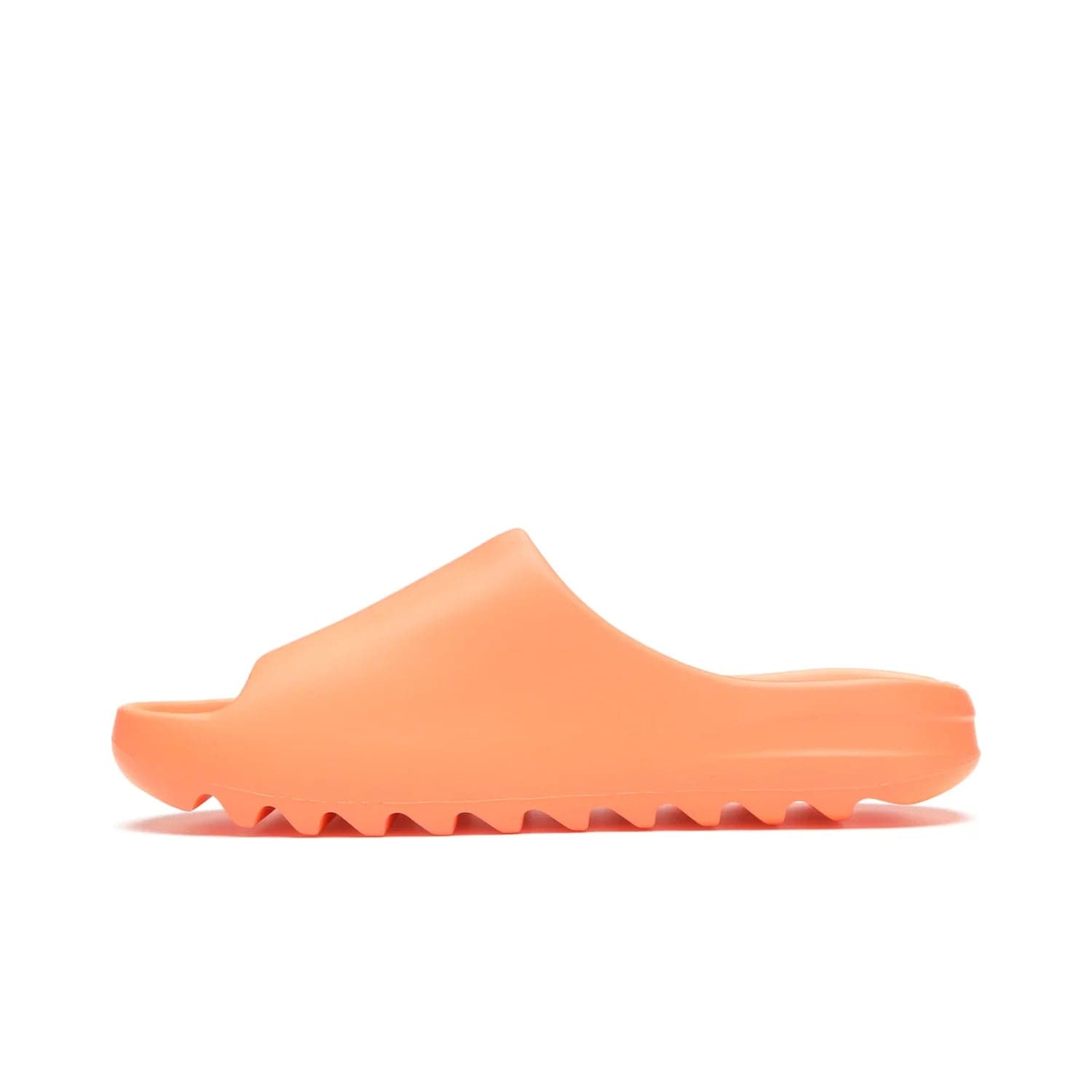 adidas Yeezy Slide Enflame Orange - Image 19 - Only at www.BallersClubKickz.com - Limited edition adidas Yeezy Slide featuring a bold Enflame Orange upper and EVA foam construction. Grooved outsole for traction and support. Released June 2021. Perfect for summer.