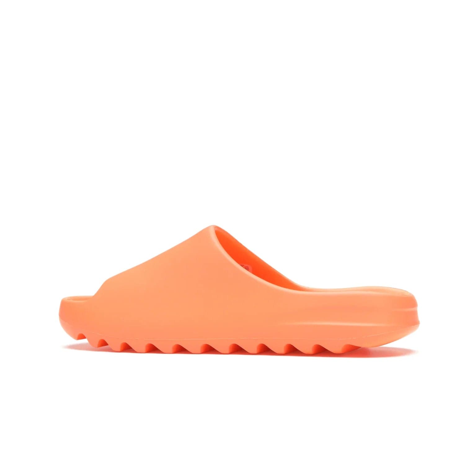 adidas Yeezy Slide Enflame Orange - Image 21 - Only at www.BallersClubKickz.com - Limited edition adidas Yeezy Slide featuring a bold Enflame Orange upper and EVA foam construction. Grooved outsole for traction and support. Released June 2021. Perfect for summer.