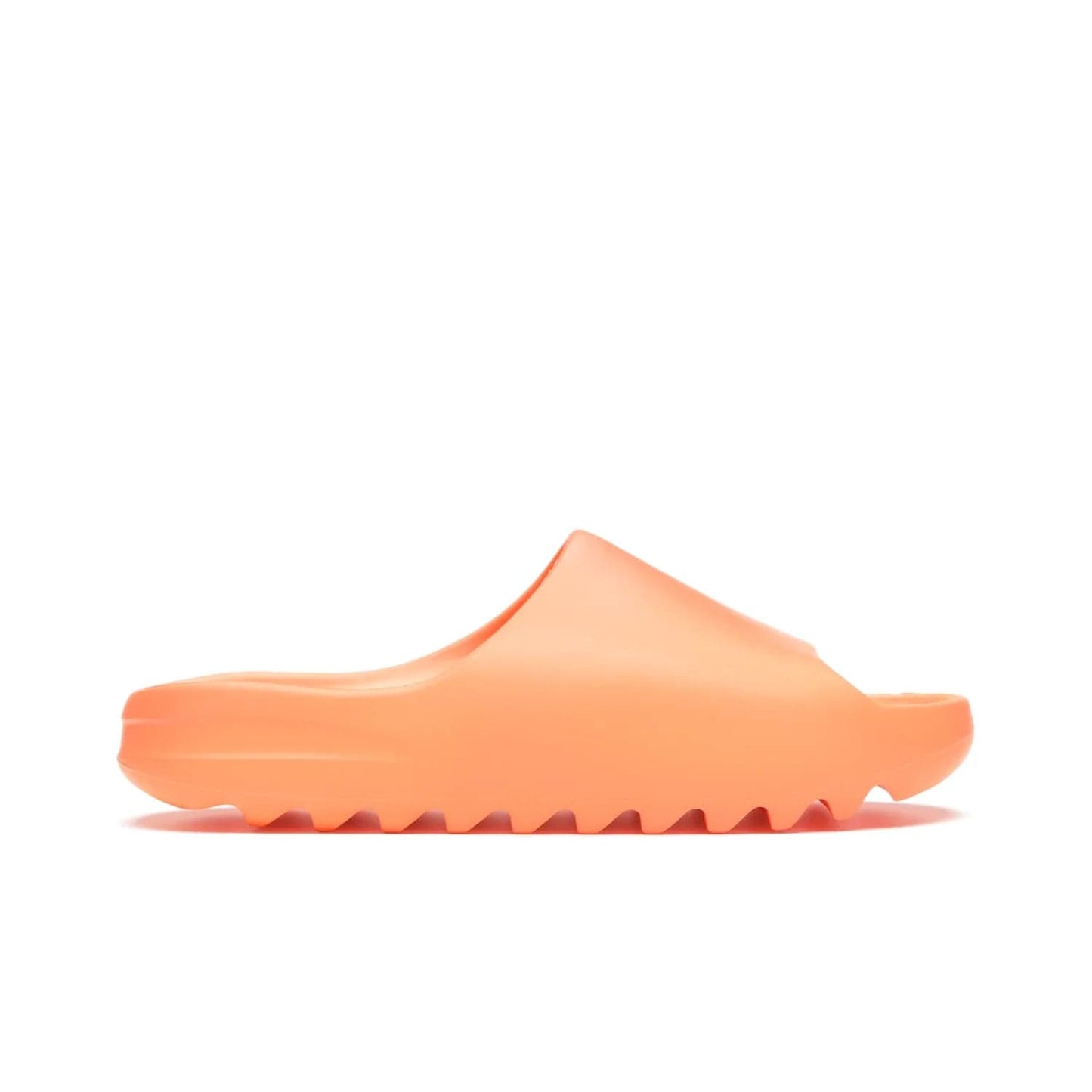 adidas Yeezy Slide Enflame Orange - Image 1 - Only at www.BallersClubKickz.com - Limited edition adidas Yeezy Slide featuring a bold Enflame Orange upper and EVA foam construction. Grooved outsole for traction and support. Released June 2021. Perfect for summer.
