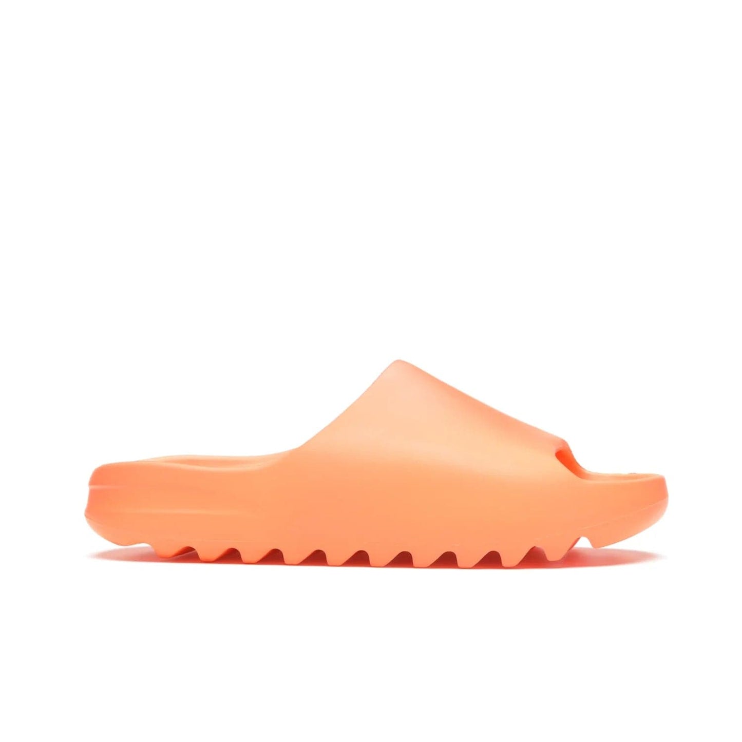 adidas Yeezy Slide Enflame Orange - Image 2 - Only at www.BallersClubKickz.com - Limited edition adidas Yeezy Slide featuring a bold Enflame Orange upper and EVA foam construction. Grooved outsole for traction and support. Released June 2021. Perfect for summer.