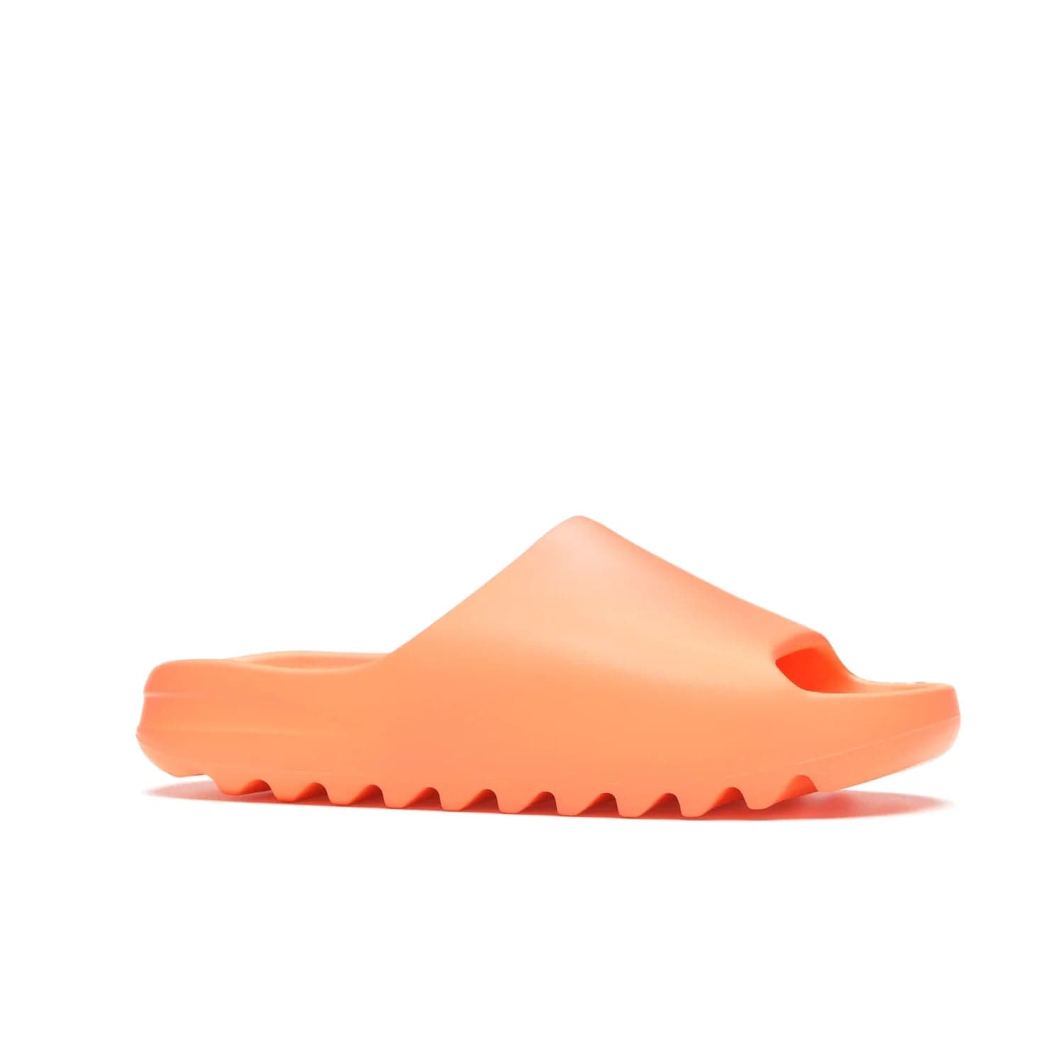 adidas Yeezy Slide Enflame Orange - Image 3 - Only at www.BallersClubKickz.com - Limited edition adidas Yeezy Slide featuring a bold Enflame Orange upper and EVA foam construction. Grooved outsole for traction and support. Released June 2021. Perfect for summer.
