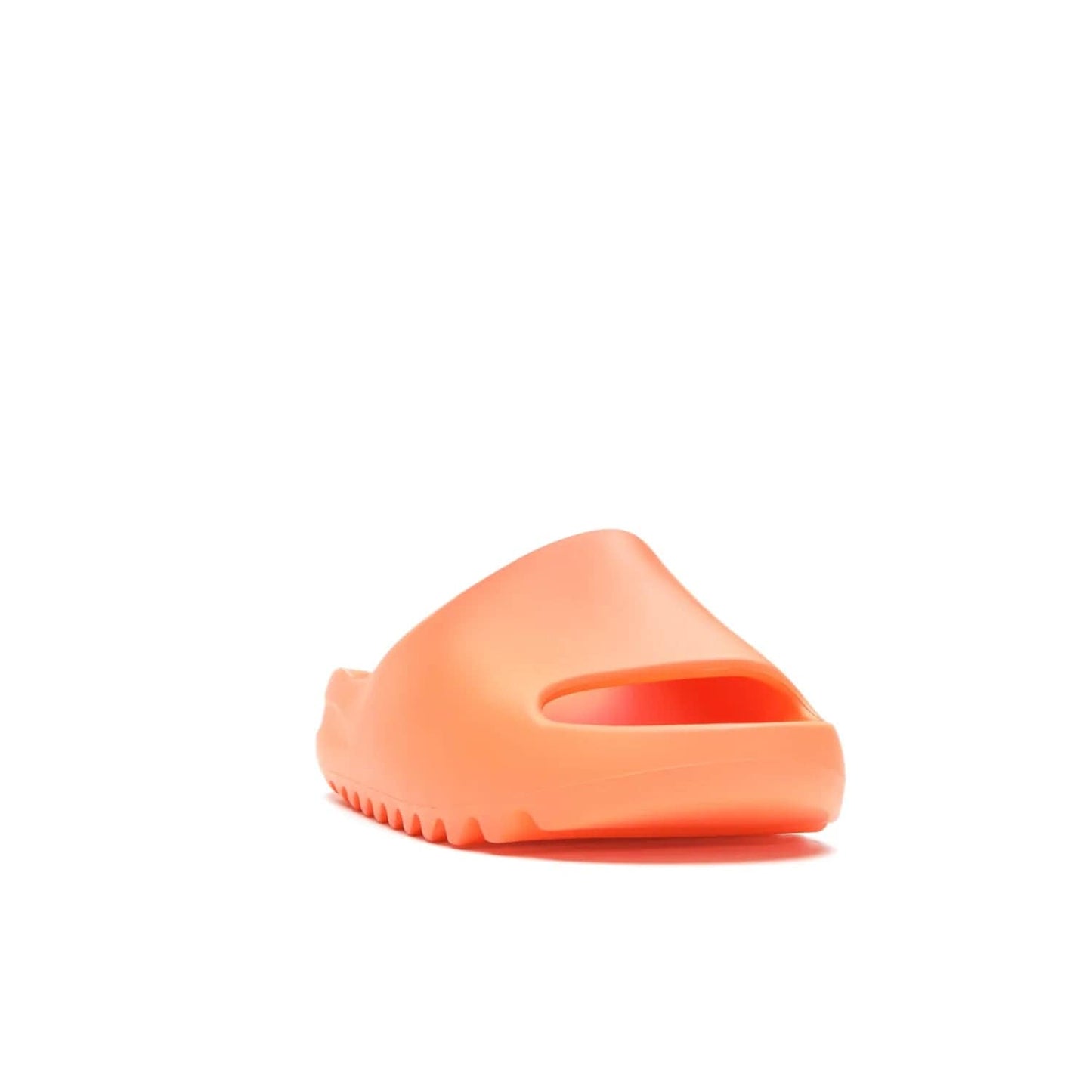 adidas Yeezy Slide Enflame Orange - Image 8 - Only at www.BallersClubKickz.com - Limited edition adidas Yeezy Slide featuring a bold Enflame Orange upper and EVA foam construction. Grooved outsole for traction and support. Released June 2021. Perfect for summer.