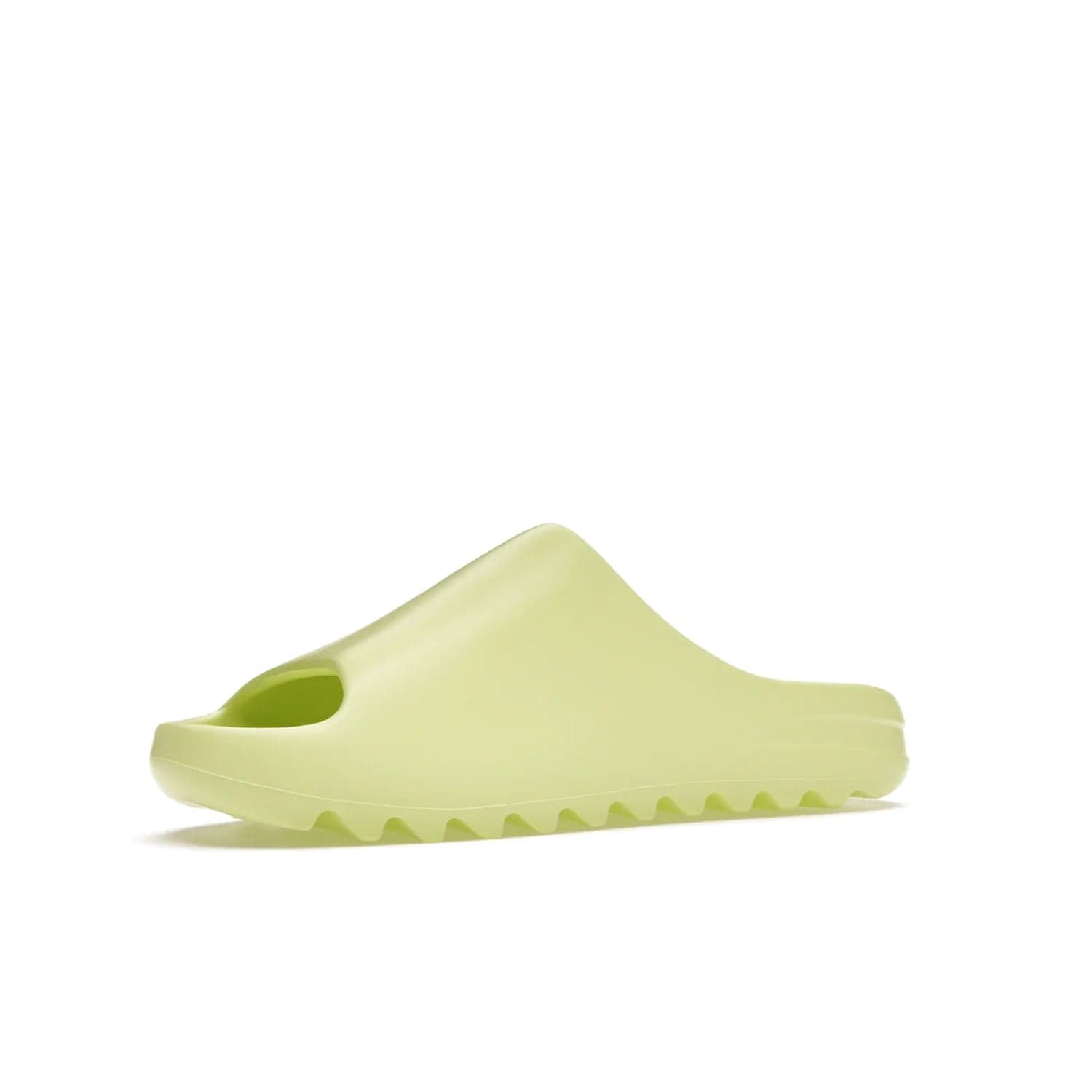 adidas Yeezy Slide Glow Green - Image 16 - Only at www.BallersClubKickz.com - Experience an unexpected summer style with the adidas Yeezy Slide Glow Green. This limited edition slide sandal provides a lightweight and durable construction and a bold Glow Green hue. Strategic grooves enhance traction and provide all-day comfort. Make a statement with the adidas Yeezy Slide Glow Green.