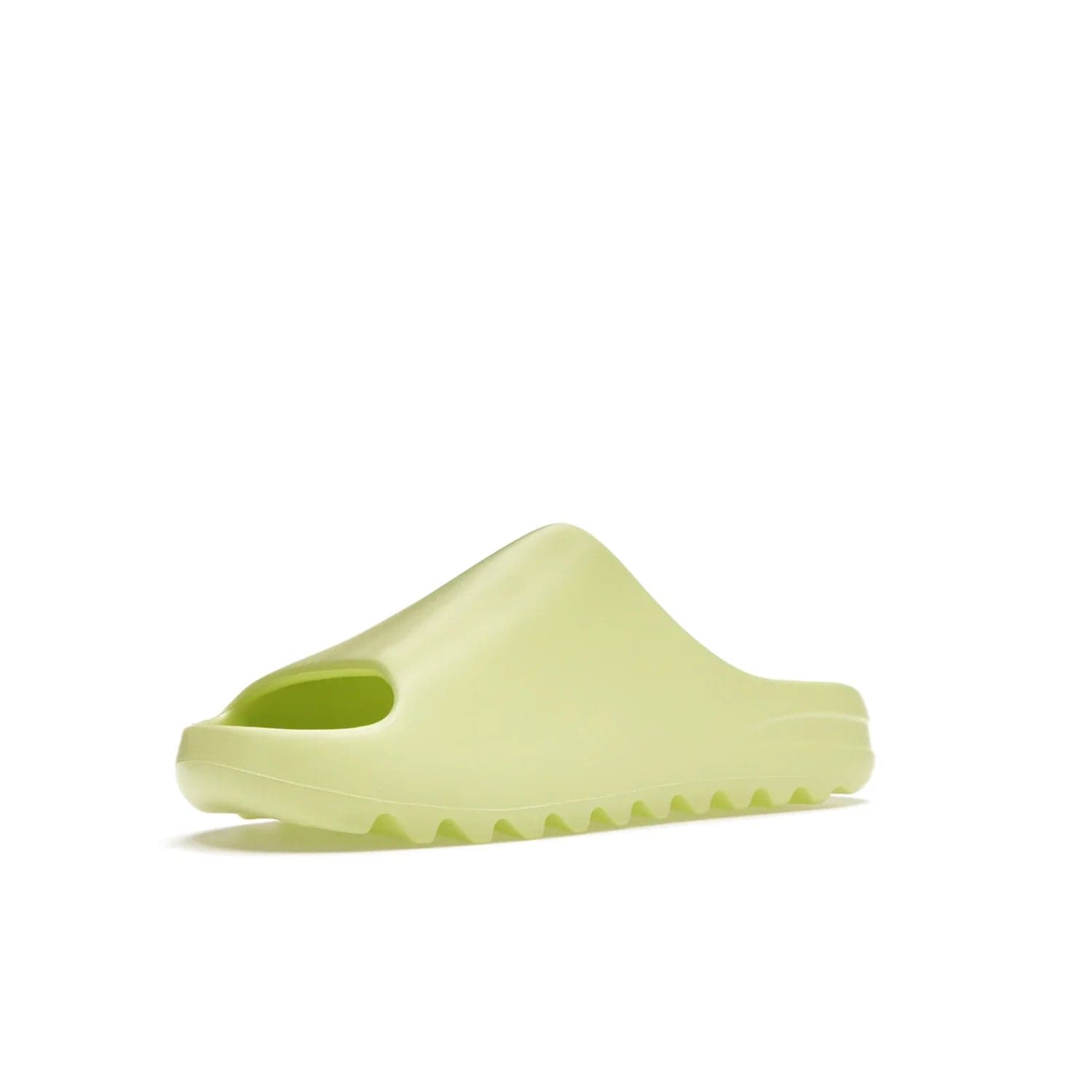 adidas Yeezy Slide Glow Green - Image 15 - Only at www.BallersClubKickz.com - Experience an unexpected summer style with the adidas Yeezy Slide Glow Green. This limited edition slide sandal provides a lightweight and durable construction and a bold Glow Green hue. Strategic grooves enhance traction and provide all-day comfort. Make a statement with the adidas Yeezy Slide Glow Green.