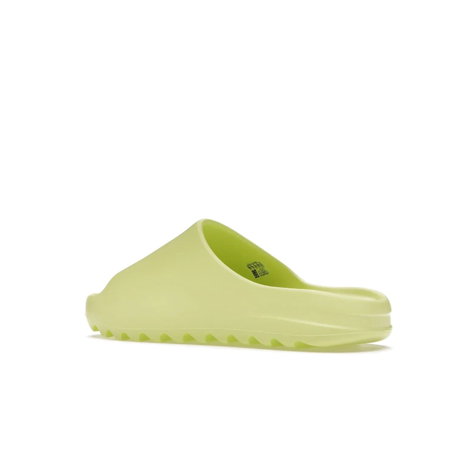 adidas Yeezy Slide Glow Green - Image 23 - Only at www.BallersClubKickz.com - Experience an unexpected summer style with the adidas Yeezy Slide Glow Green. This limited edition slide sandal provides a lightweight and durable construction and a bold Glow Green hue. Strategic grooves enhance traction and provide all-day comfort. Make a statement with the adidas Yeezy Slide Glow Green.
