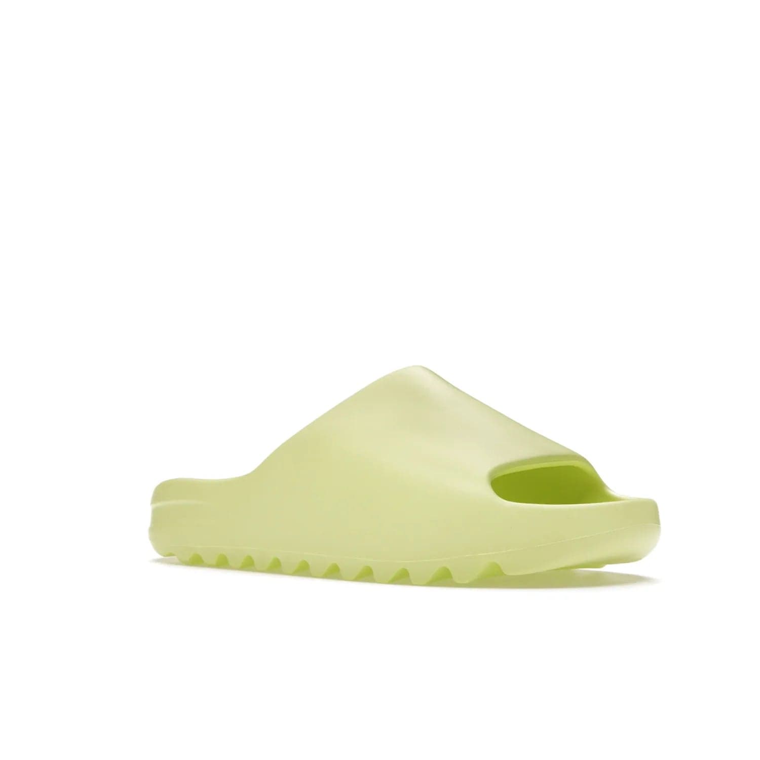 adidas Yeezy Slide Glow Green - Image 5 - Only at www.BallersClubKickz.com - Experience an unexpected summer style with the adidas Yeezy Slide Glow Green. This limited edition slide sandal provides a lightweight and durable construction and a bold Glow Green hue. Strategic grooves enhance traction and provide all-day comfort. Make a statement with the adidas Yeezy Slide Glow Green.