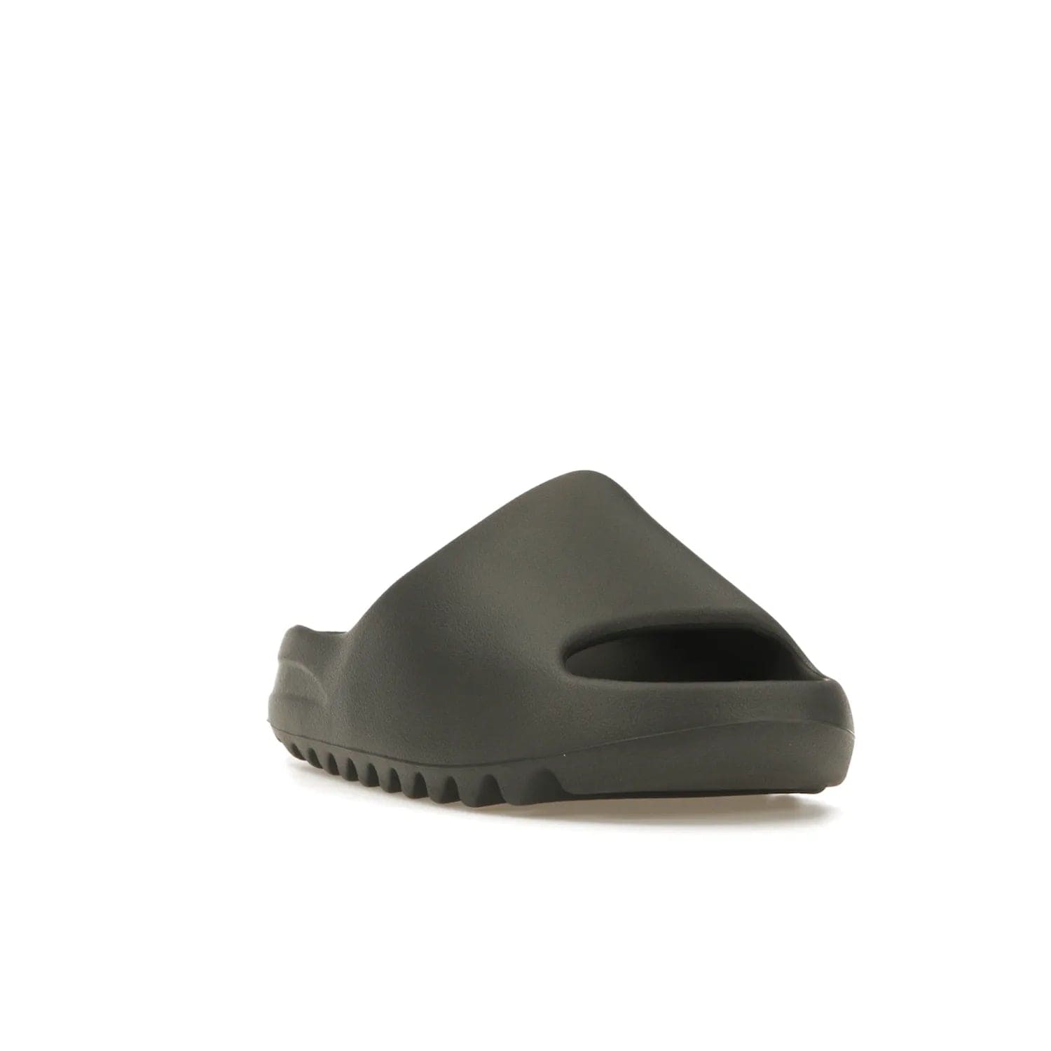 adidas Yeezy Slide Granite - Image 7 - Only at www.BallersClubKickz.com - Introducing the adidas Yeezy Slide Granite with a sleek, soft-to-touch one-piece upper – perfect for making a statement with its minimalistic design and luxurious comfort. Get yours now for only $70.