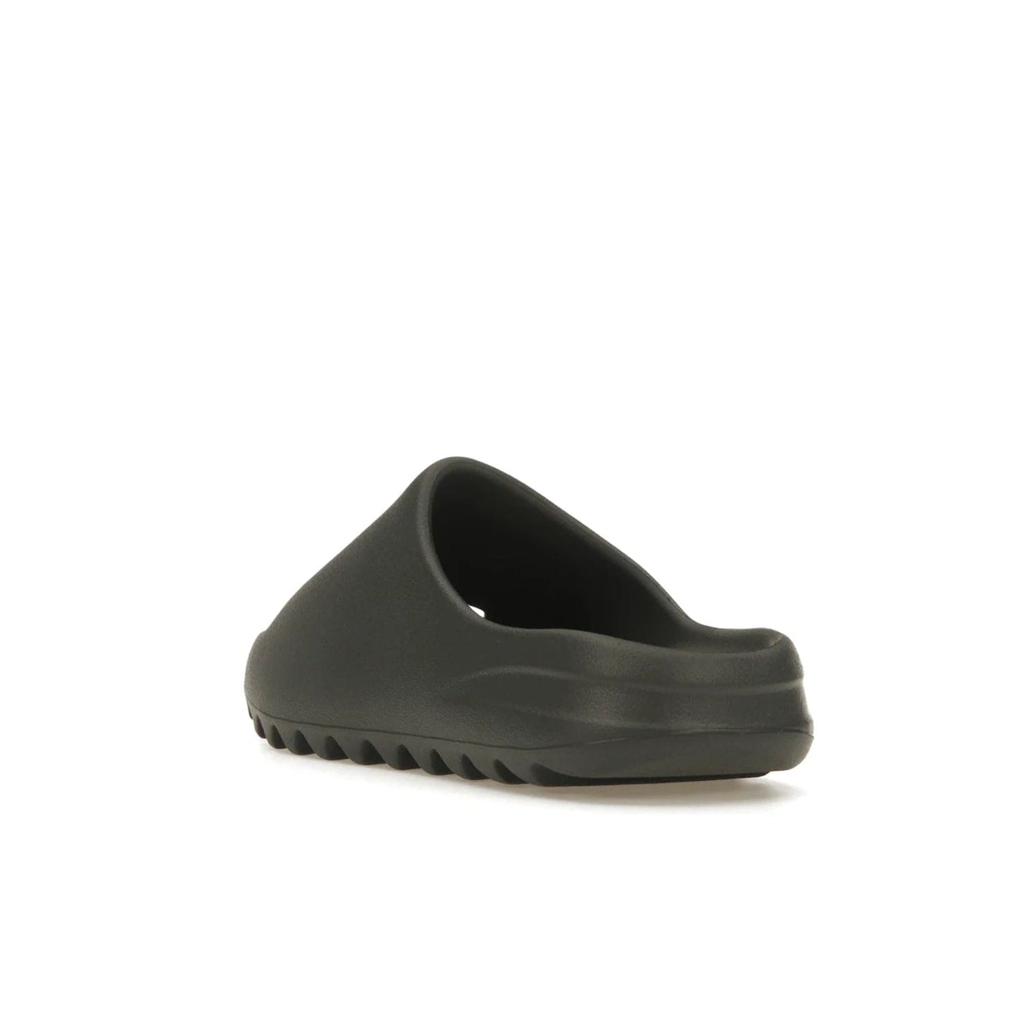 adidas Yeezy Slide Granite - Image 25 - Only at www.BallersClubKickz.com - Introducing the adidas Yeezy Slide Granite with a sleek, soft-to-touch one-piece upper – perfect for making a statement with its minimalistic design and luxurious comfort. Get yours now for only $70.