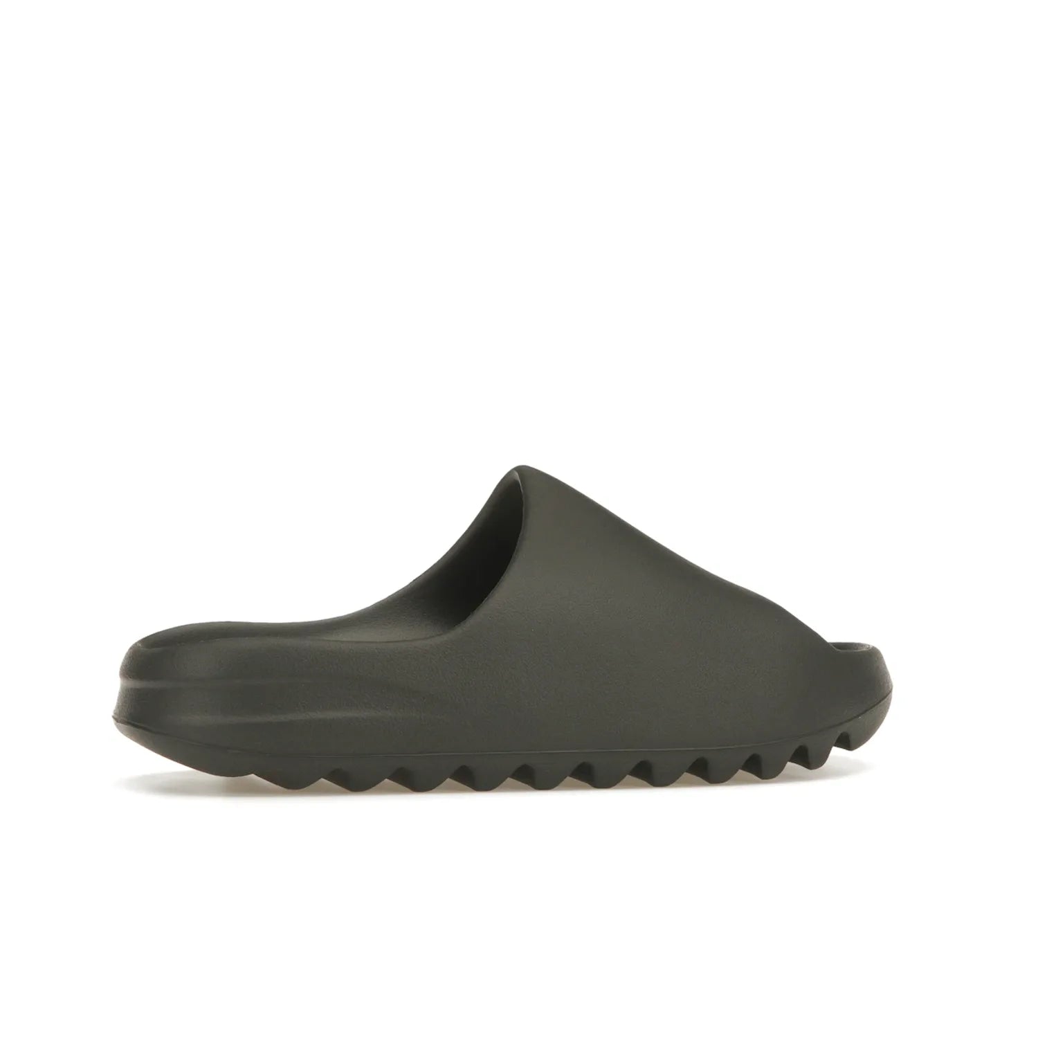 adidas Yeezy Slide Granite - Image 35 - Only at www.BallersClubKickz.com - Introducing the adidas Yeezy Slide Granite with a sleek, soft-to-touch one-piece upper – perfect for making a statement with its minimalistic design and luxurious comfort. Get yours now for only $70.