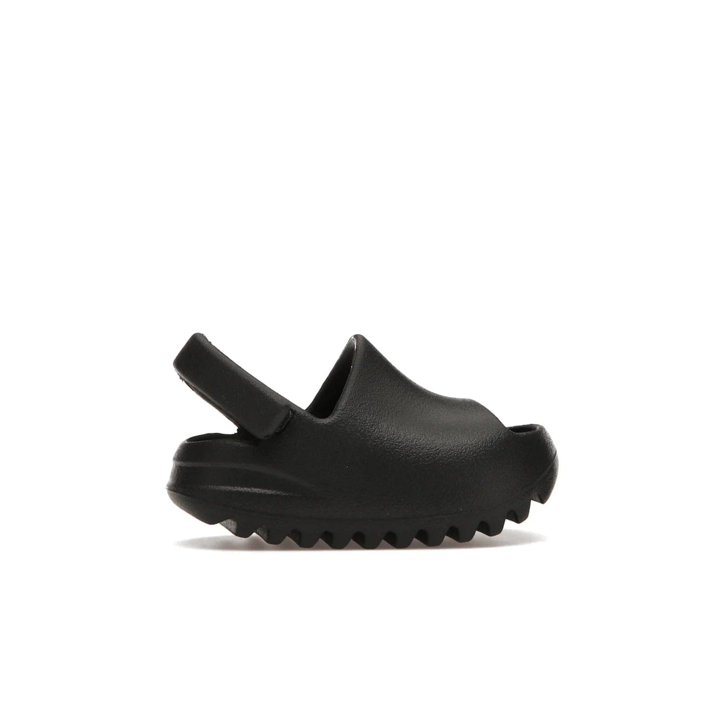 adidas Yeezy Slide Onyx (Infants) - Image 36 - Only at www.BallersClubKickz.com - The Adidas Yeezy Slide Onyx (Infant) is a classic silhouette with unique features and durable EVA foam. Released in May 2021 with a starting price of $70, it's no wonder it quickly gained popularity with its cool, minimalist look.