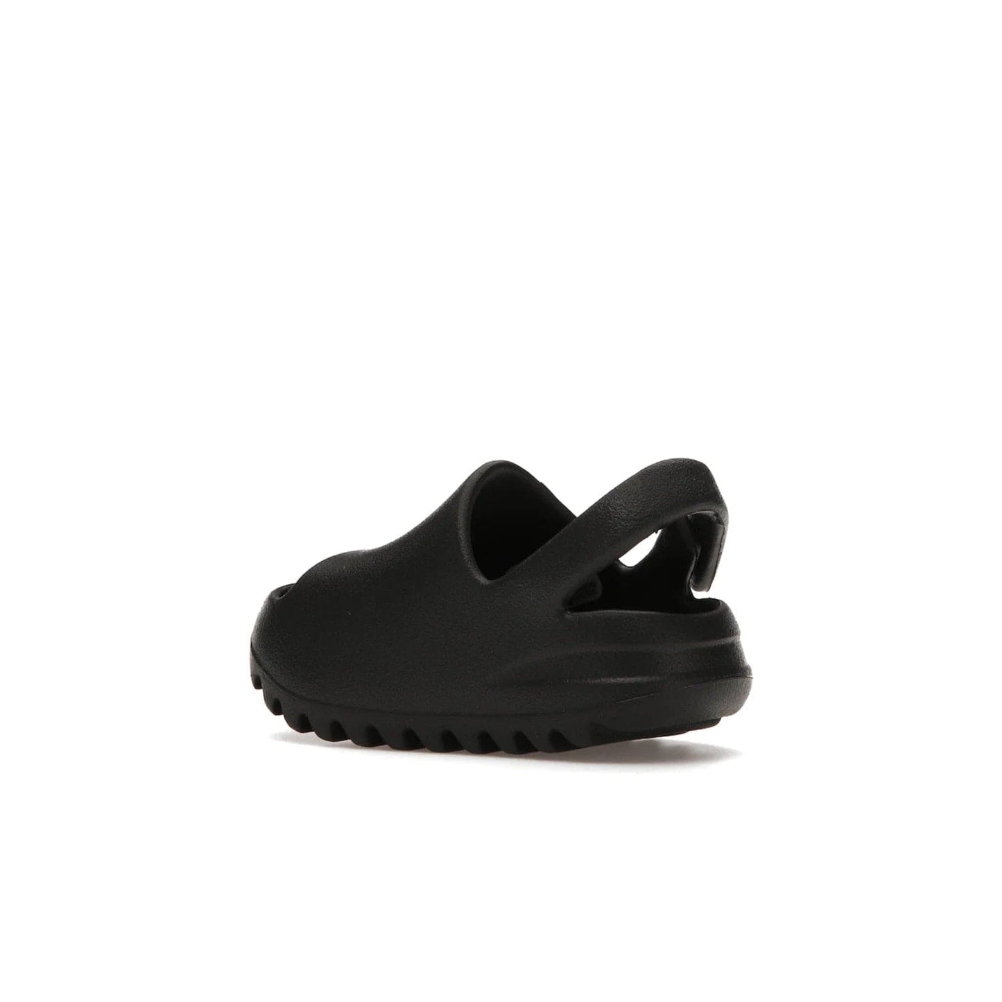 adidas Yeezy Slide Onyx (Infants) - Image 23 - Only at www.BallersClubKickz.com - The Adidas Yeezy Slide Onyx (Infant) is a classic silhouette with unique features and durable EVA foam. Released in May 2021 with a starting price of $70, it's no wonder it quickly gained popularity with its cool, minimalist look.