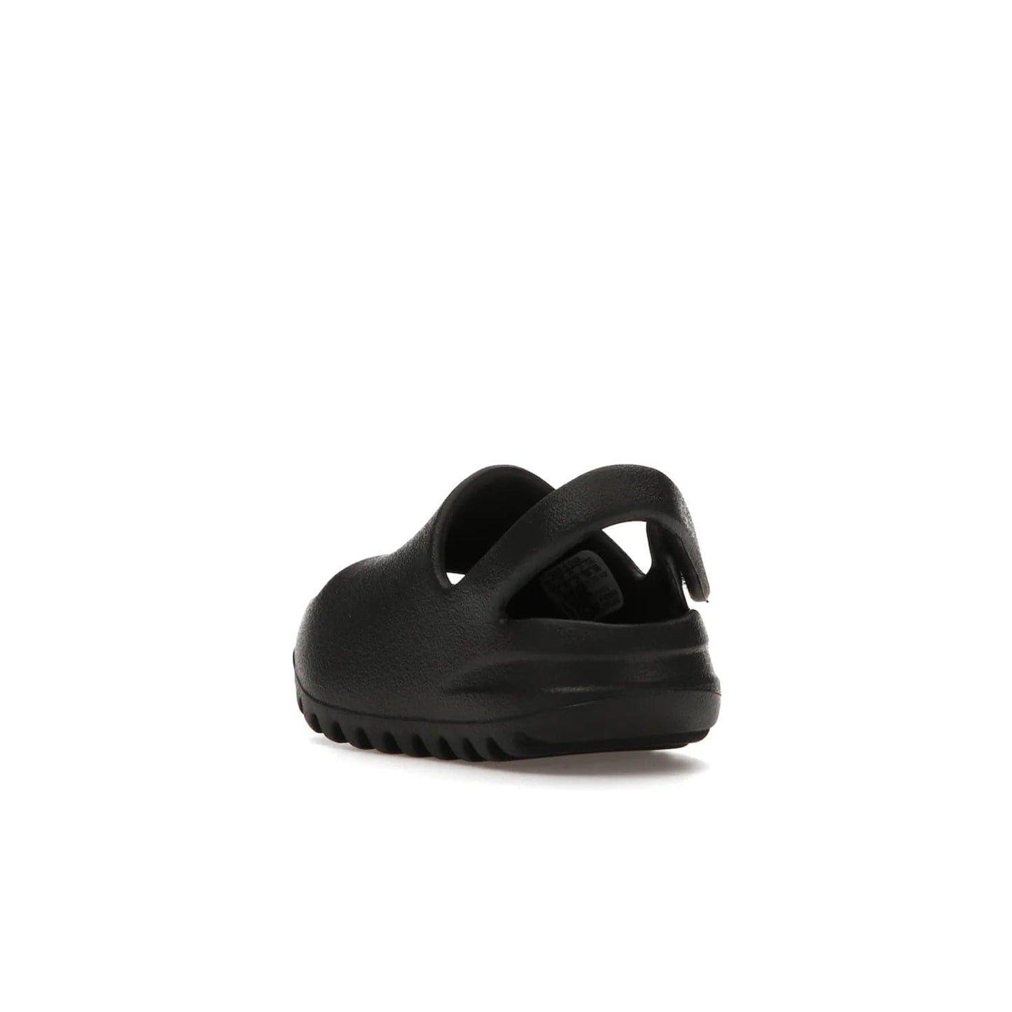 adidas Yeezy Slide Onyx (Infants) - Image 25 - Only at www.BallersClubKickz.com - The Adidas Yeezy Slide Onyx (Infant) is a classic silhouette with unique features and durable EVA foam. Released in May 2021 with a starting price of $70, it's no wonder it quickly gained popularity with its cool, minimalist look.
