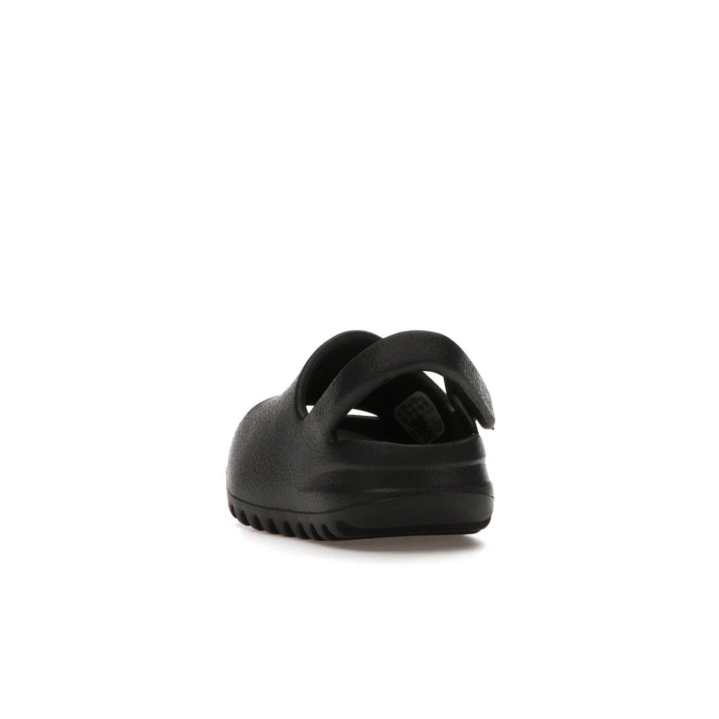 adidas Yeezy Slide Onyx (Infants) - Image 26 - Only at www.BallersClubKickz.com - The Adidas Yeezy Slide Onyx (Infant) is a classic silhouette with unique features and durable EVA foam. Released in May 2021 with a starting price of $70, it's no wonder it quickly gained popularity with its cool, minimalist look.