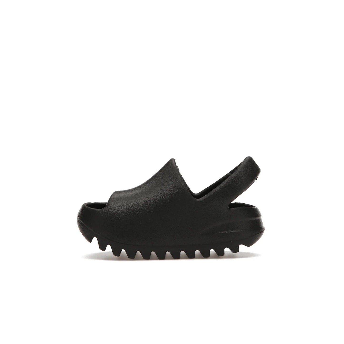 adidas Yeezy Slide Onyx (Infants) - Image 19 - Only at www.BallersClubKickz.com - The Adidas Yeezy Slide Onyx (Infant) is a classic silhouette with unique features and durable EVA foam. Released in May 2021 with a starting price of $70, it's no wonder it quickly gained popularity with its cool, minimalist look.