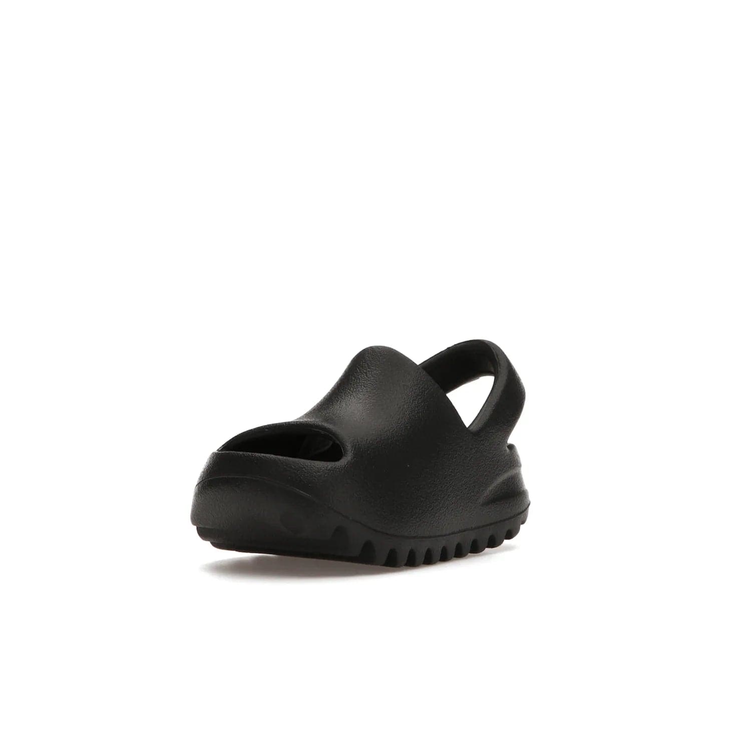 adidas Yeezy Slide Onyx (Infants) - Image 14 - Only at www.BallersClubKickz.com - The Adidas Yeezy Slide Onyx (Infant) is a classic silhouette with unique features and durable EVA foam. Released in May 2021 with a starting price of $70, it's no wonder it quickly gained popularity with its cool, minimalist look.