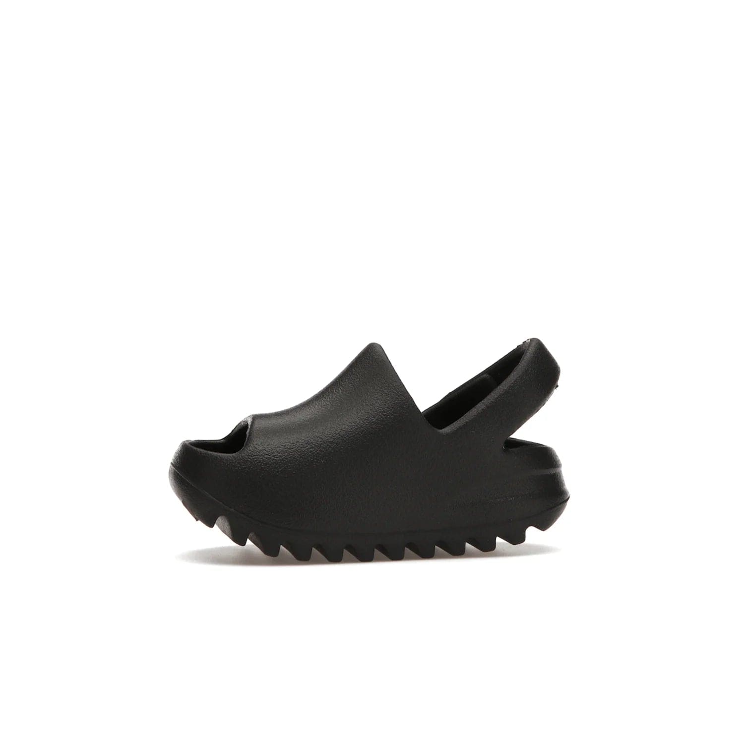 adidas Yeezy Slide Onyx (Infants) - Image 18 - Only at www.BallersClubKickz.com - The Adidas Yeezy Slide Onyx (Infant) is a classic silhouette with unique features and durable EVA foam. Released in May 2021 with a starting price of $70, it's no wonder it quickly gained popularity with its cool, minimalist look.