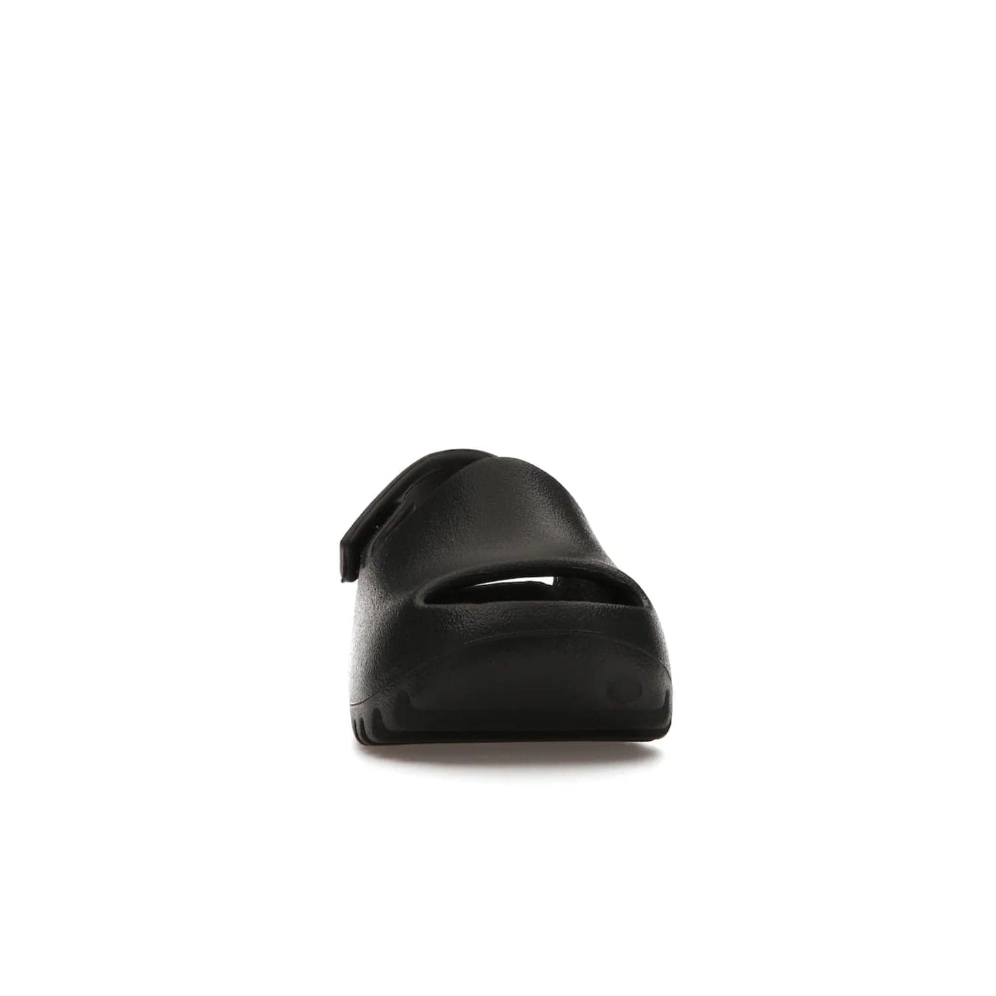 adidas Yeezy Slide Onyx (Infants) - Image 9 - Only at www.BallersClubKickz.com - The Adidas Yeezy Slide Onyx (Infant) is a classic silhouette with unique features and durable EVA foam. Released in May 2021 with a starting price of $70, it's no wonder it quickly gained popularity with its cool, minimalist look.