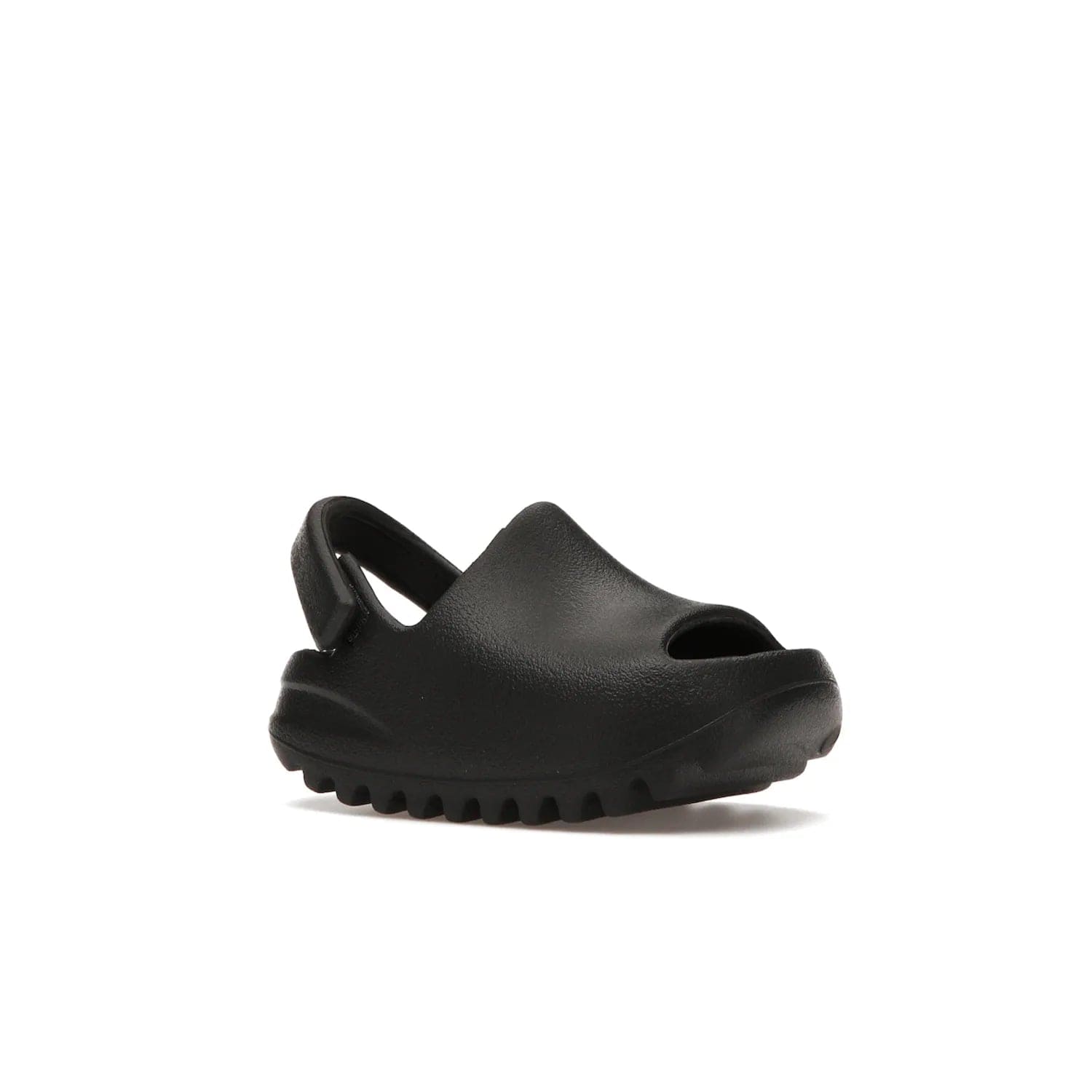 adidas Yeezy Slide Onyx (Infants) - Image 4 - Only at www.BallersClubKickz.com - The Adidas Yeezy Slide Onyx (Infant) is a classic silhouette with unique features and durable EVA foam. Released in May 2021 with a starting price of $70, it's no wonder it quickly gained popularity with its cool, minimalist look.
