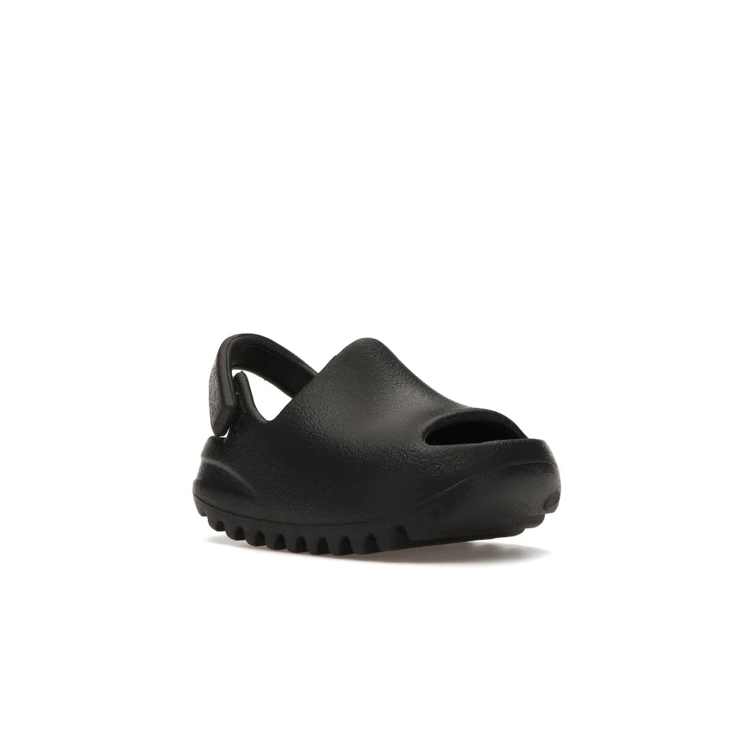 adidas Yeezy Slide Onyx (Infants) - Image 5 - Only at www.BallersClubKickz.com - The Adidas Yeezy Slide Onyx (Infant) is a classic silhouette with unique features and durable EVA foam. Released in May 2021 with a starting price of $70, it's no wonder it quickly gained popularity with its cool, minimalist look.