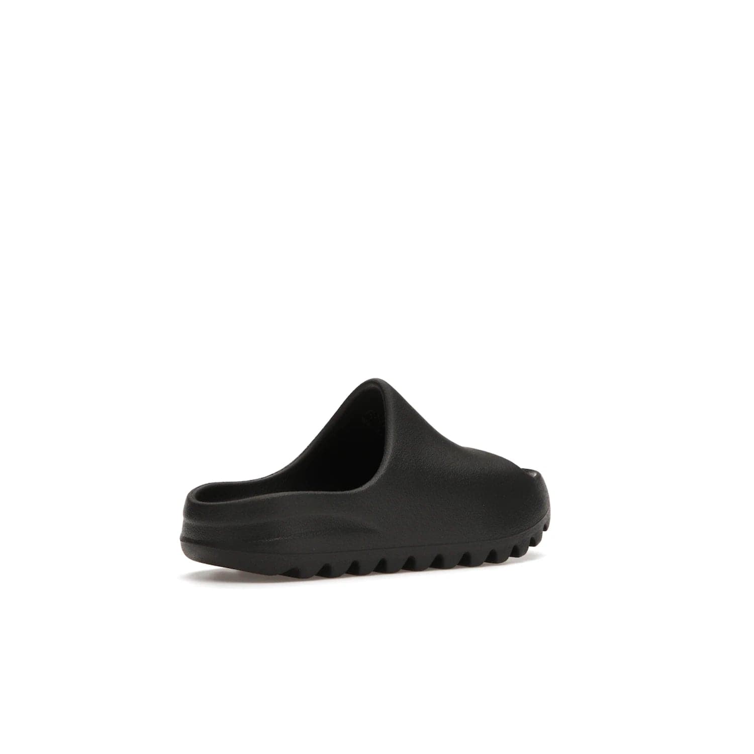 adidas Yeezy Slide Onyx (Kids) - Image 33 - Only at www.BallersClubKickz.com - adidas Yeezy Slide Onyx (Kids): Comfortable foam construction with textured surface and iconic three-stripe logo. Breathable, open-toe design and deep grooves for traction. Released in March 2021 at $50.