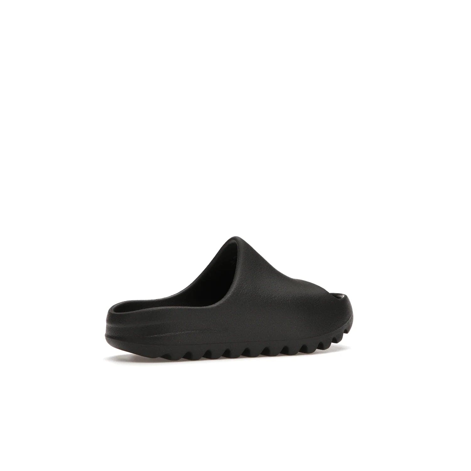 adidas Yeezy Slide Onyx (Kids) - Image 34 - Only at www.BallersClubKickz.com - adidas Yeezy Slide Onyx (Kids): Comfortable foam construction with textured surface and iconic three-stripe logo. Breathable, open-toe design and deep grooves for traction. Released in March 2021 at $50.