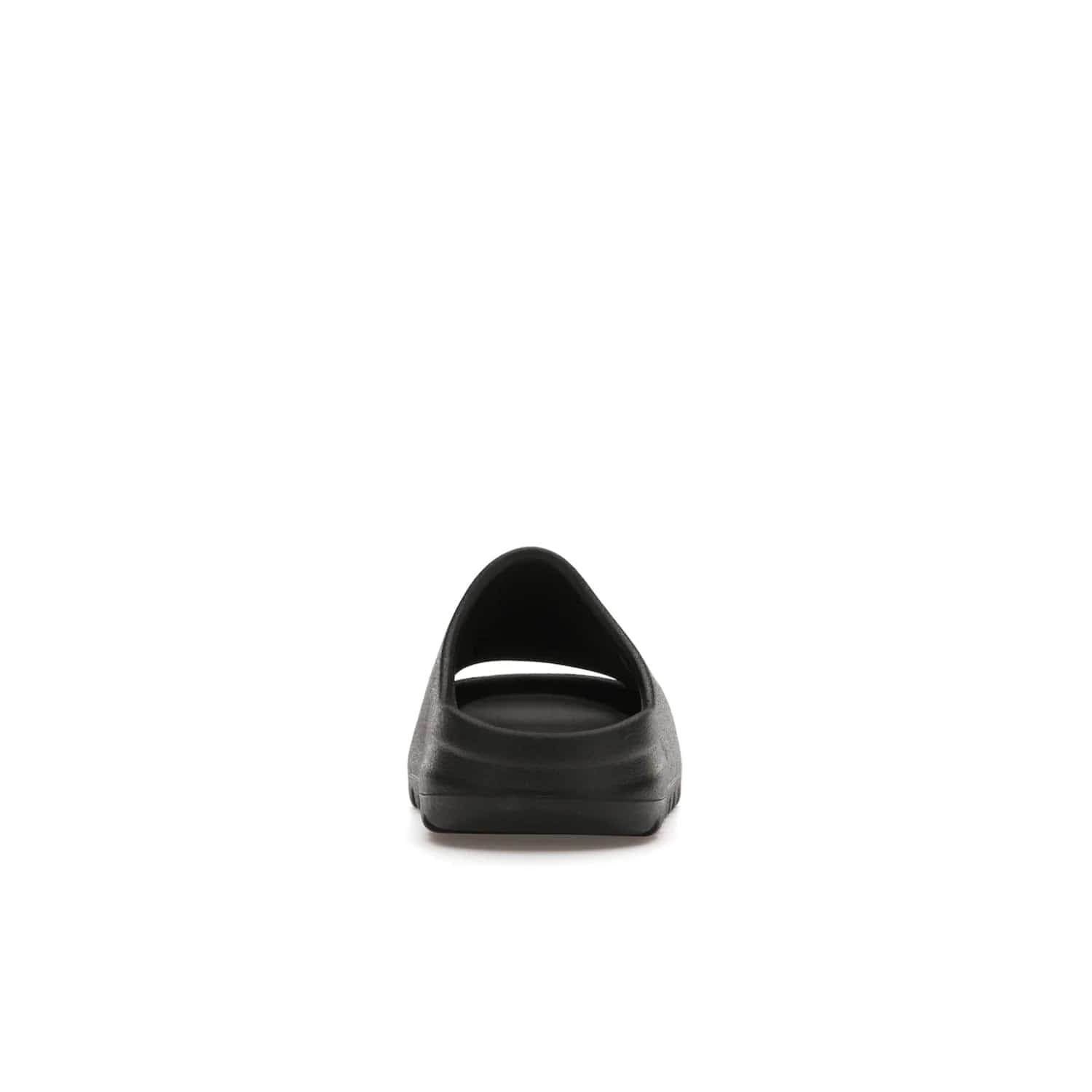 adidas Yeezy Slide Onyx (Kids) - Image 28 - Only at www.BallersClubKickz.com - adidas Yeezy Slide Onyx (Kids): Comfortable foam construction with textured surface and iconic three-stripe logo. Breathable, open-toe design and deep grooves for traction. Released in March 2021 at $50.