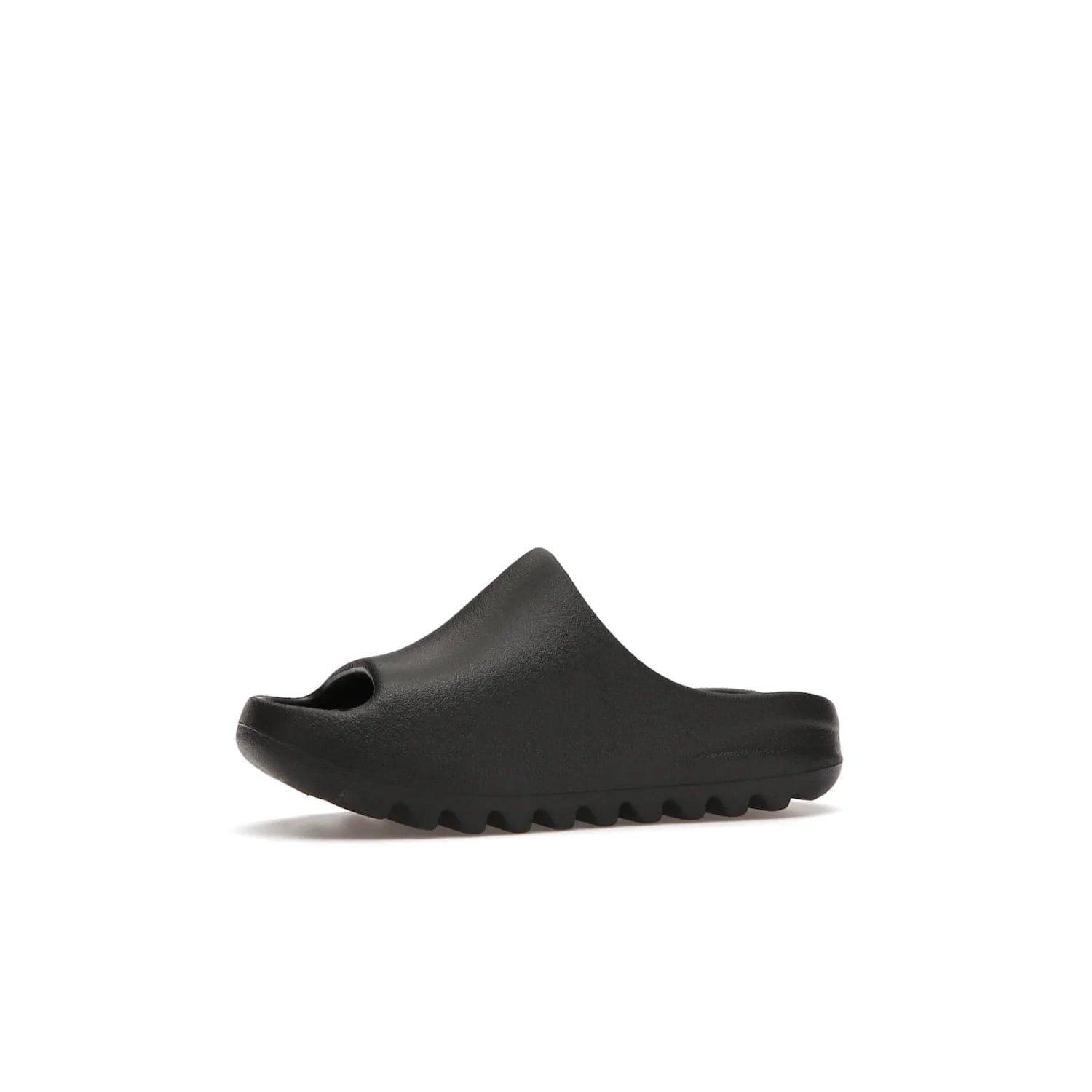 adidas Yeezy Slide Onyx (Kids) - Image 17 - Only at www.BallersClubKickz.com - adidas Yeezy Slide Onyx (Kids): Comfortable foam construction with textured surface and iconic three-stripe logo. Breathable, open-toe design and deep grooves for traction. Released in March 2021 at $50.
