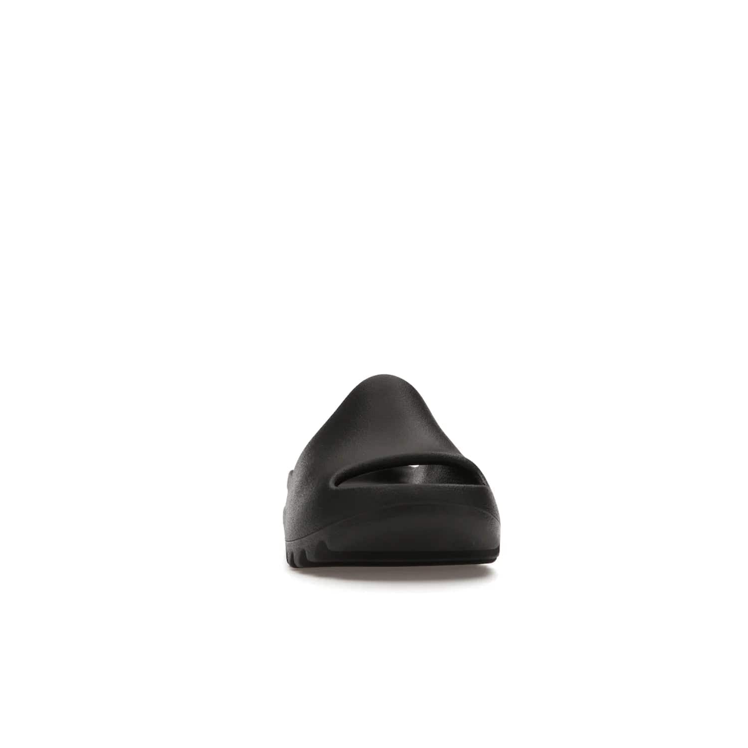 adidas Yeezy Slide Onyx (Kids) - Image 9 - Only at www.BallersClubKickz.com - adidas Yeezy Slide Onyx (Kids): Comfortable foam construction with textured surface and iconic three-stripe logo. Breathable, open-toe design and deep grooves for traction. Released in March 2021 at $50.