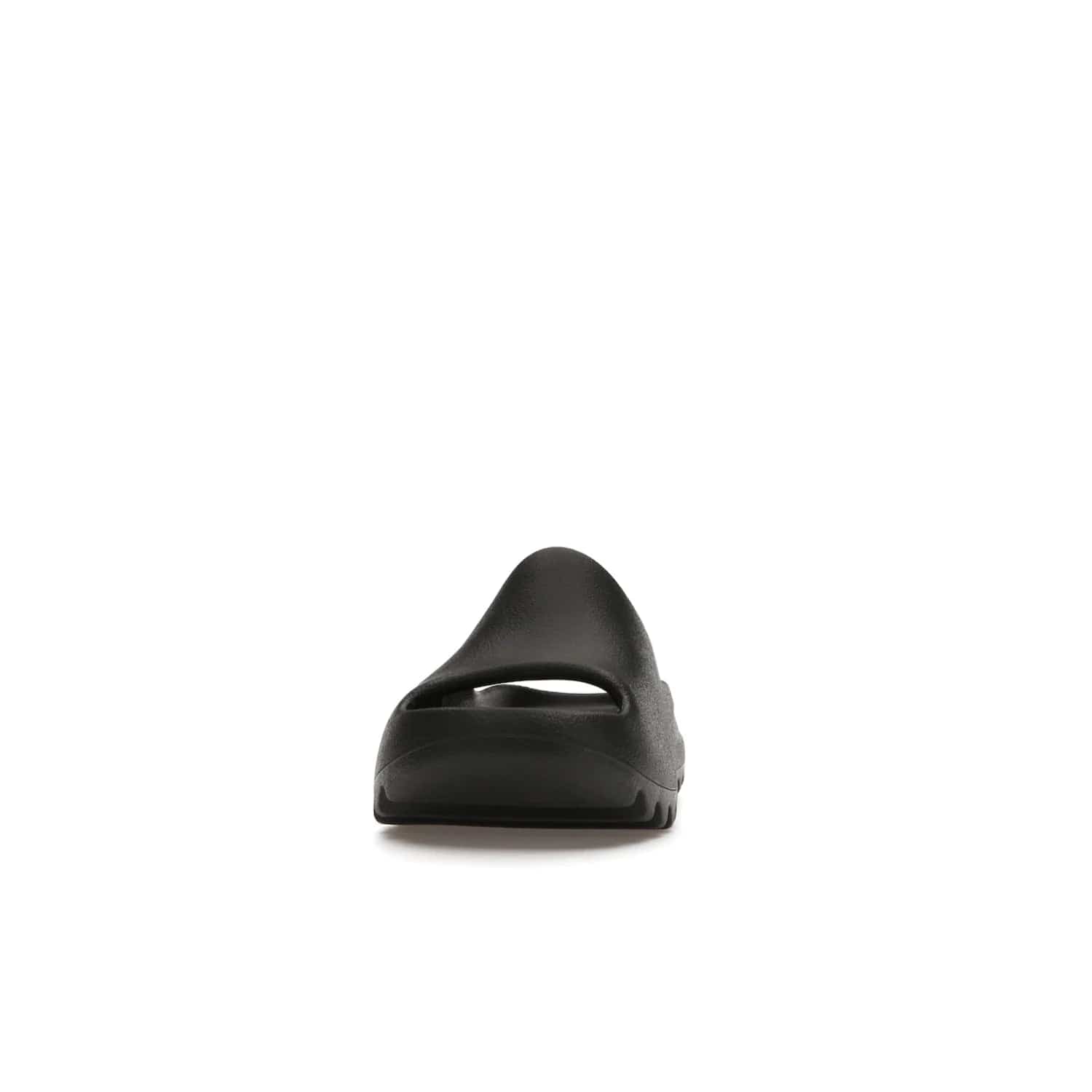 adidas Yeezy Slide Onyx (Kids) - Image 11 - Only at www.BallersClubKickz.com - adidas Yeezy Slide Onyx (Kids): Comfortable foam construction with textured surface and iconic three-stripe logo. Breathable, open-toe design and deep grooves for traction. Released in March 2021 at $50.