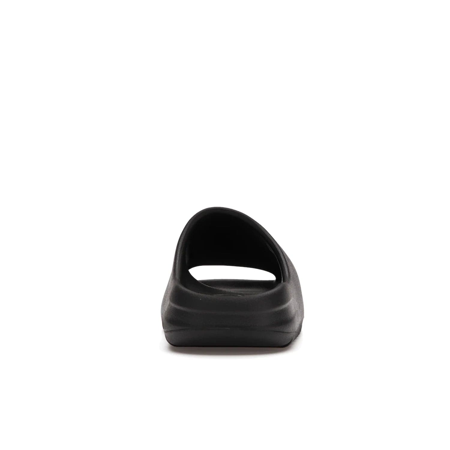 adidas Yeezy Slide Onyx - Image 28 - Only at www.BallersClubKickz.com - Step into comfort and style with the adidas Yeezy Slide Onyx. Featuring foam construction, an all-black colorway and a grooved outsole for stability and responsiveness, this versatile slide is a must-have for your collection.