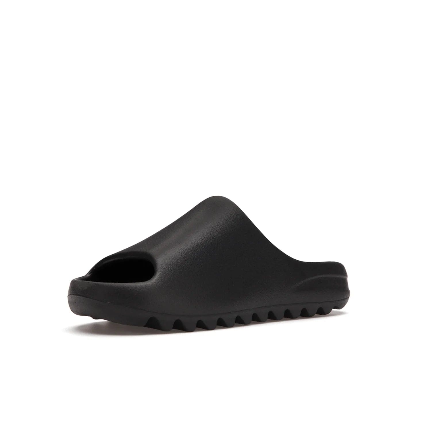 adidas Yeezy Slide Onyx - Image 15 - Only at www.BallersClubKickz.com - Step into comfort and style with the adidas Yeezy Slide Onyx. Featuring foam construction, an all-black colorway and a grooved outsole for stability and responsiveness, this versatile slide is a must-have for your collection.